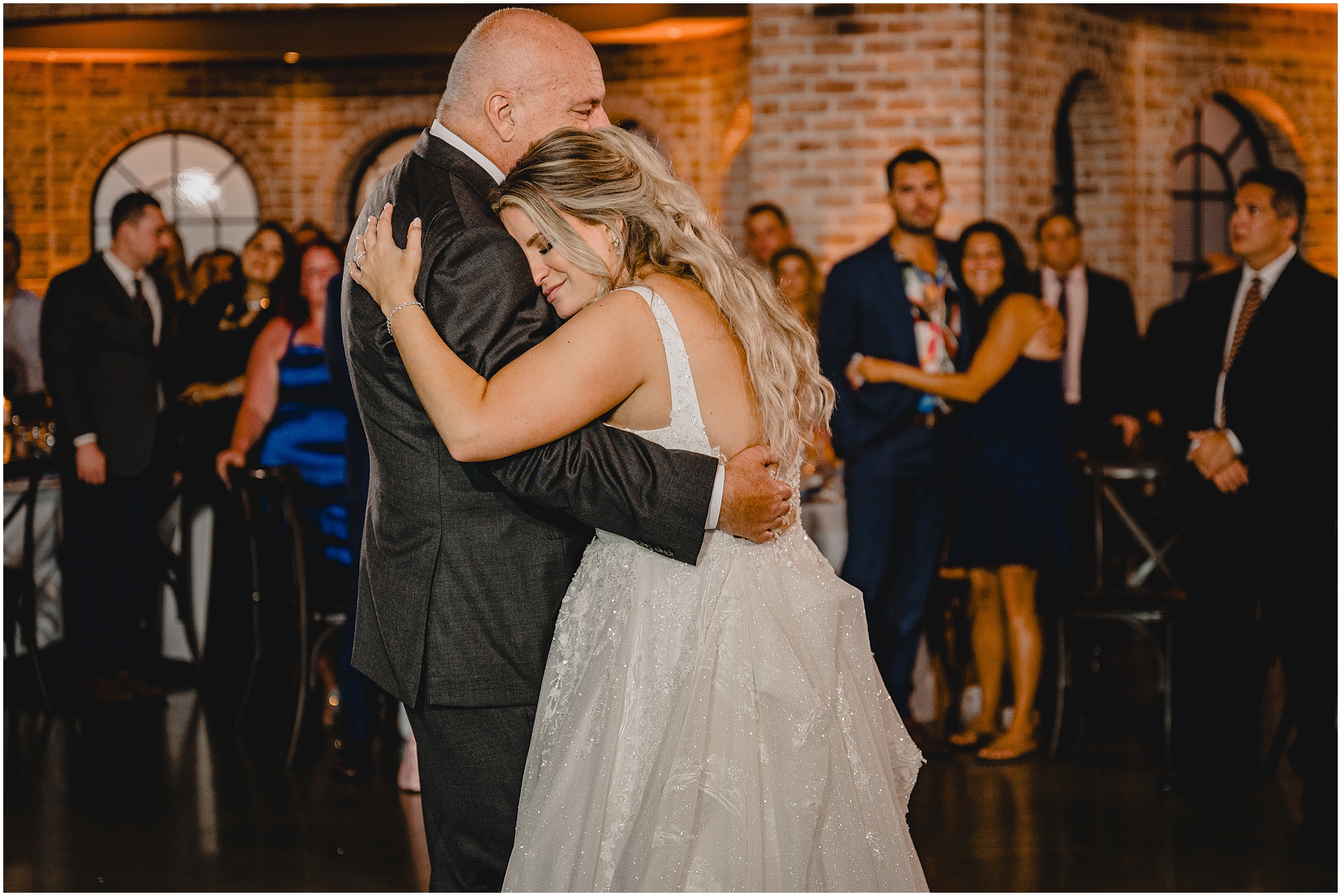 bride hugs dad during dance at Andover NJ wedding reception 