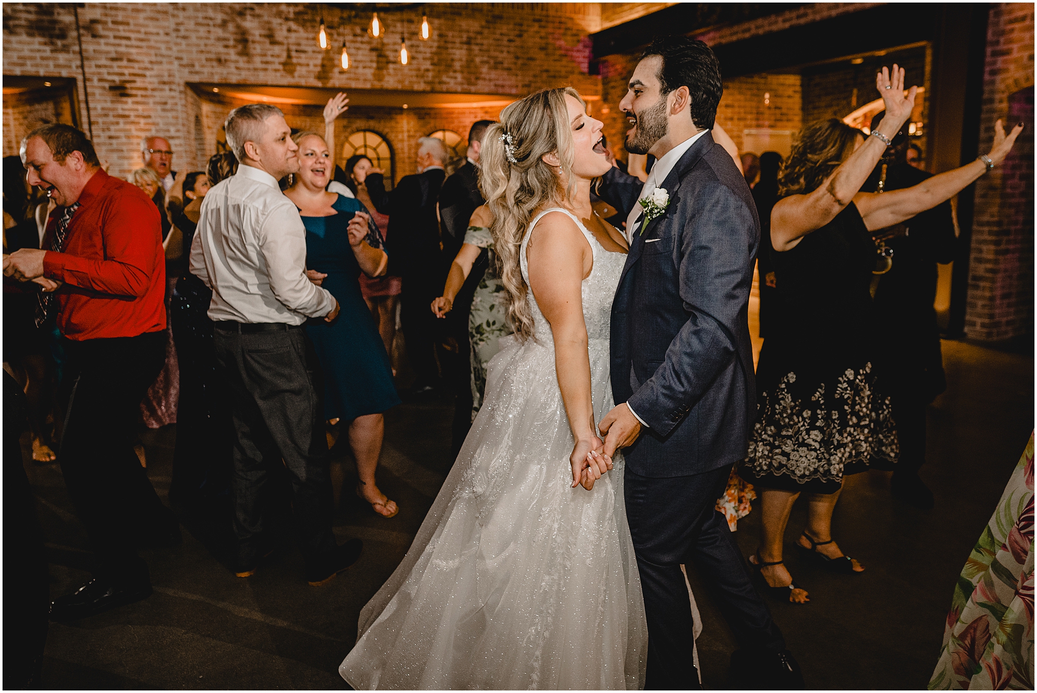 newlyweds dance with guests during Andover NJ wedding reception 