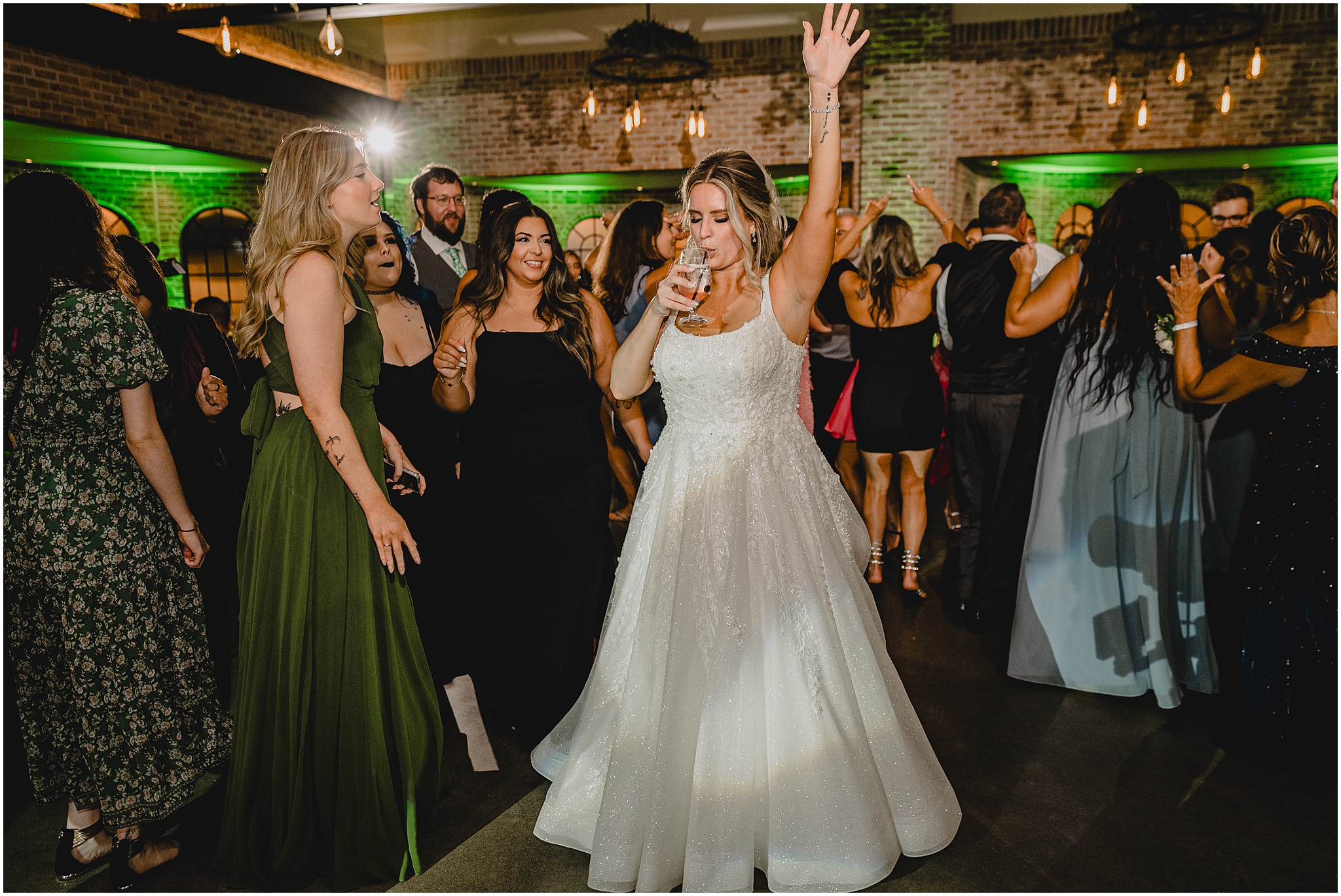 bride dances and drinks during Andover NJ wedding reception 