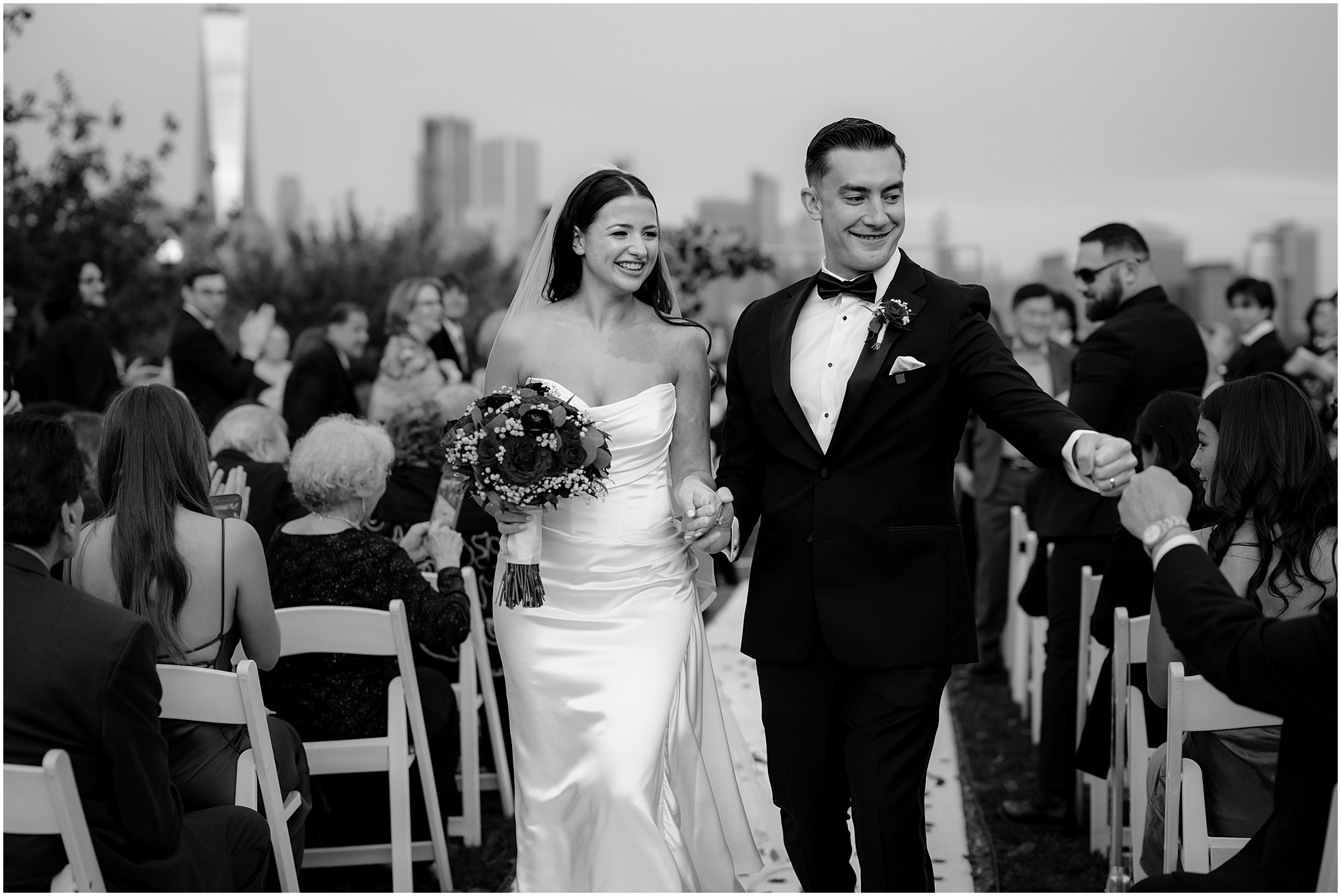 bride and groom walk up aisle leaving the Liberty House wedding ceremony 
