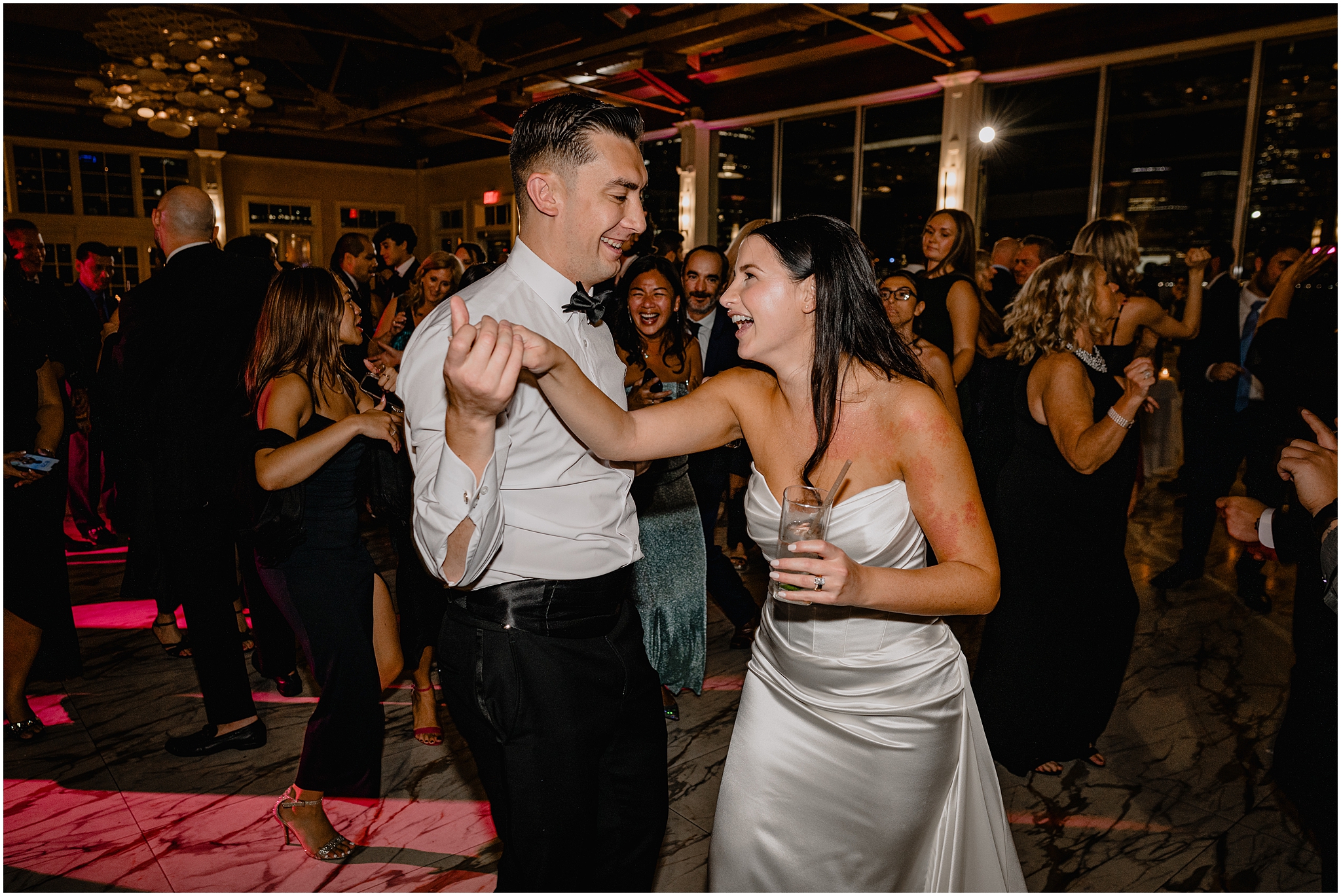 bride and groom dance together during Jersey City wedding reception