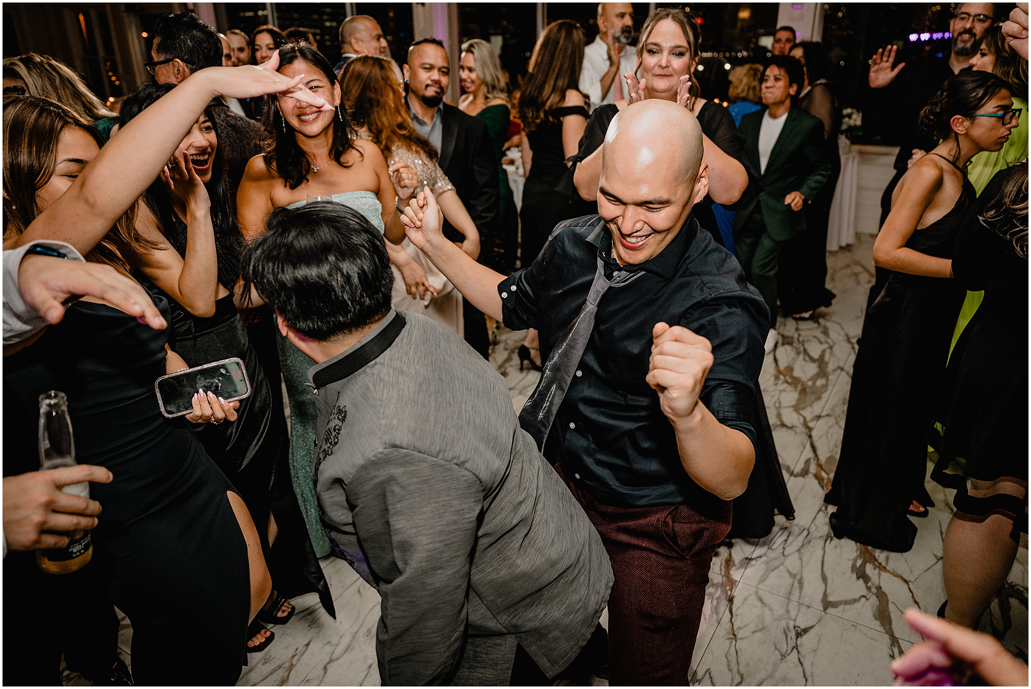 wedding guests dance during Jersey City wedding reception
