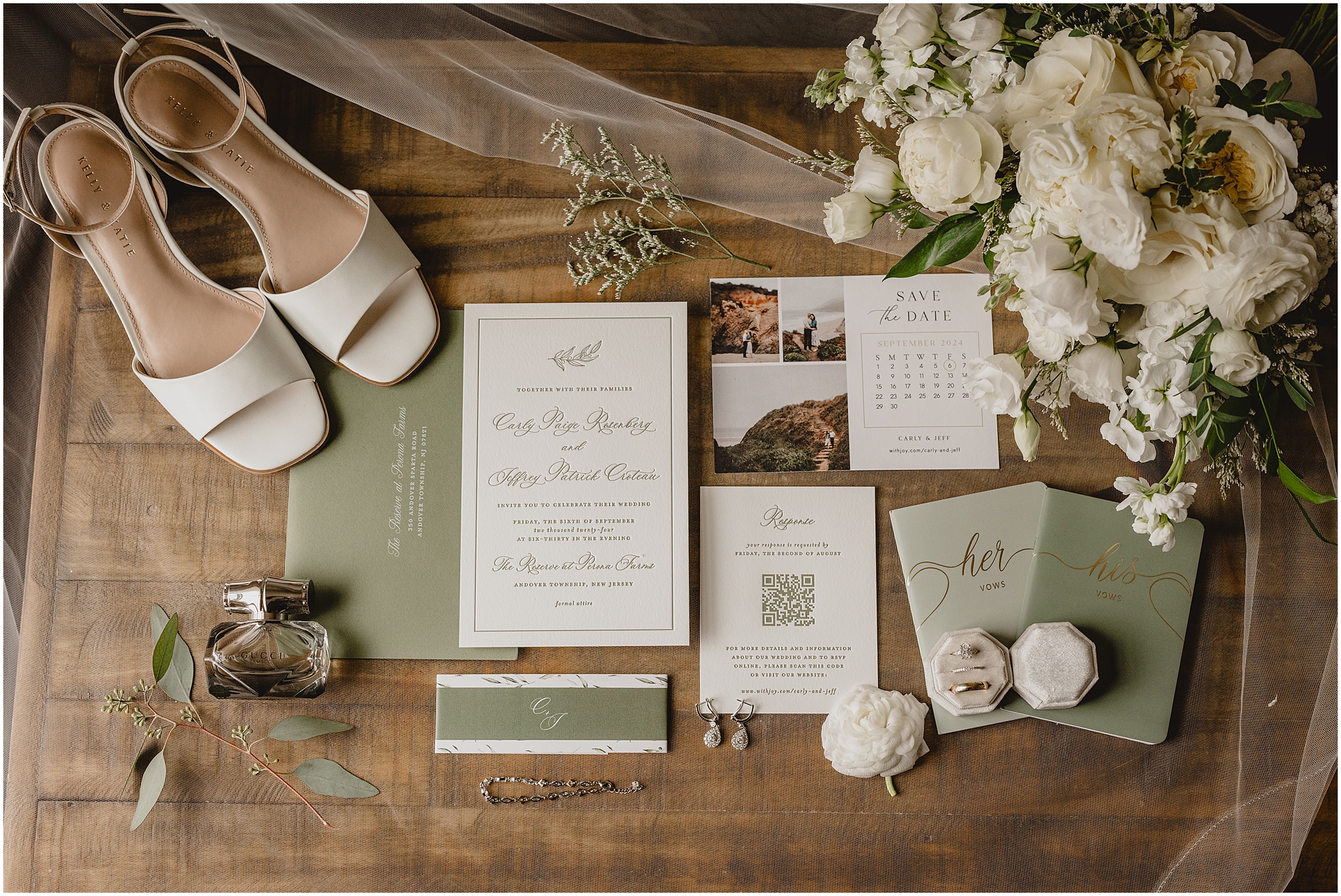 sage green and white invitation suite with ring boxes and bride's shoes and ivory rose bouquet 