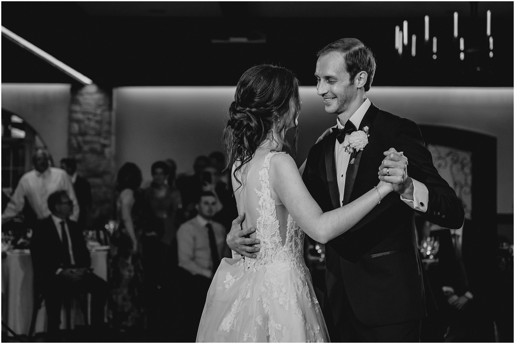 groom smiles at bride during Reserve wedding reception at Perona Farms