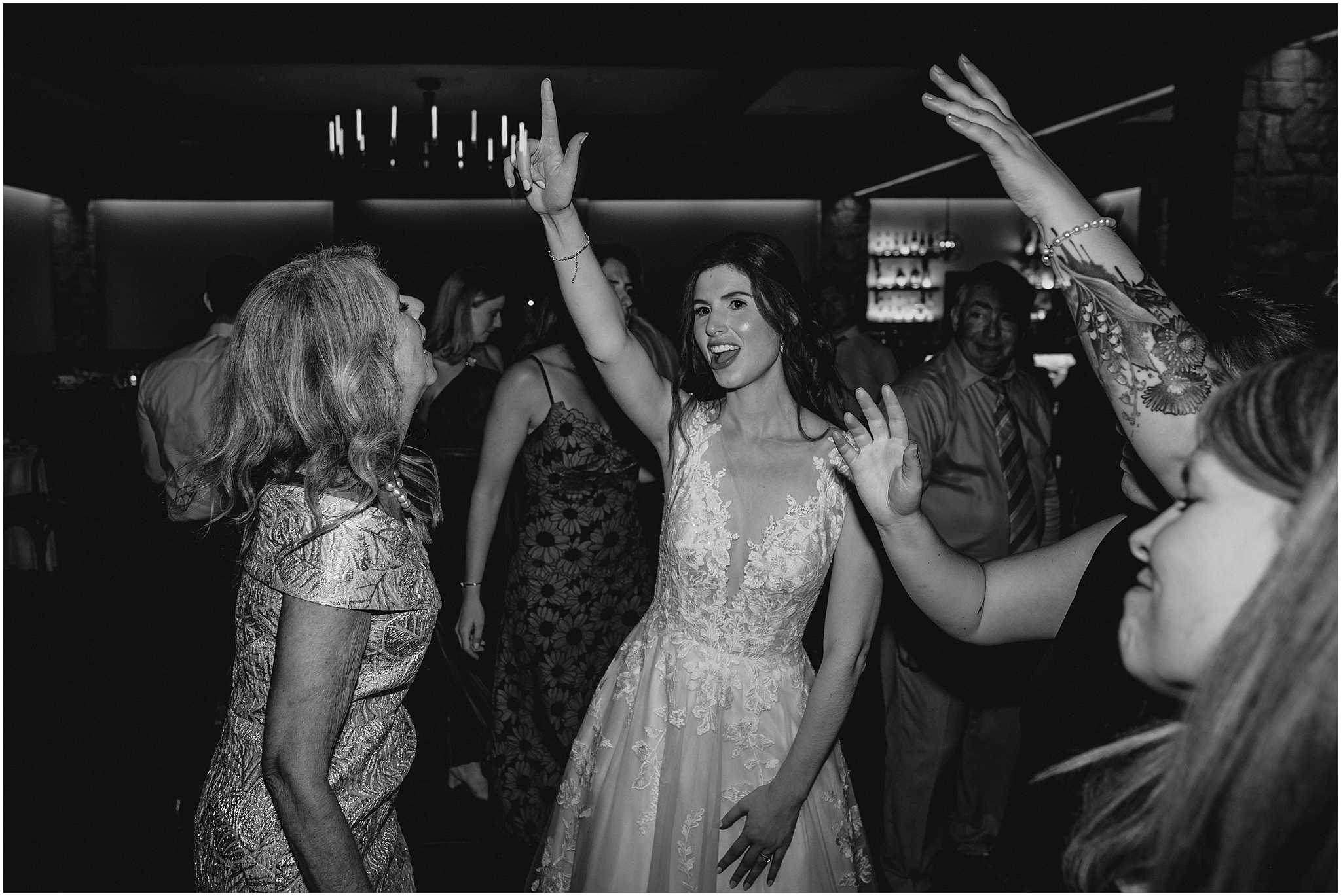 bride dances with guests in ballroom of Andover NJ wedding venue 