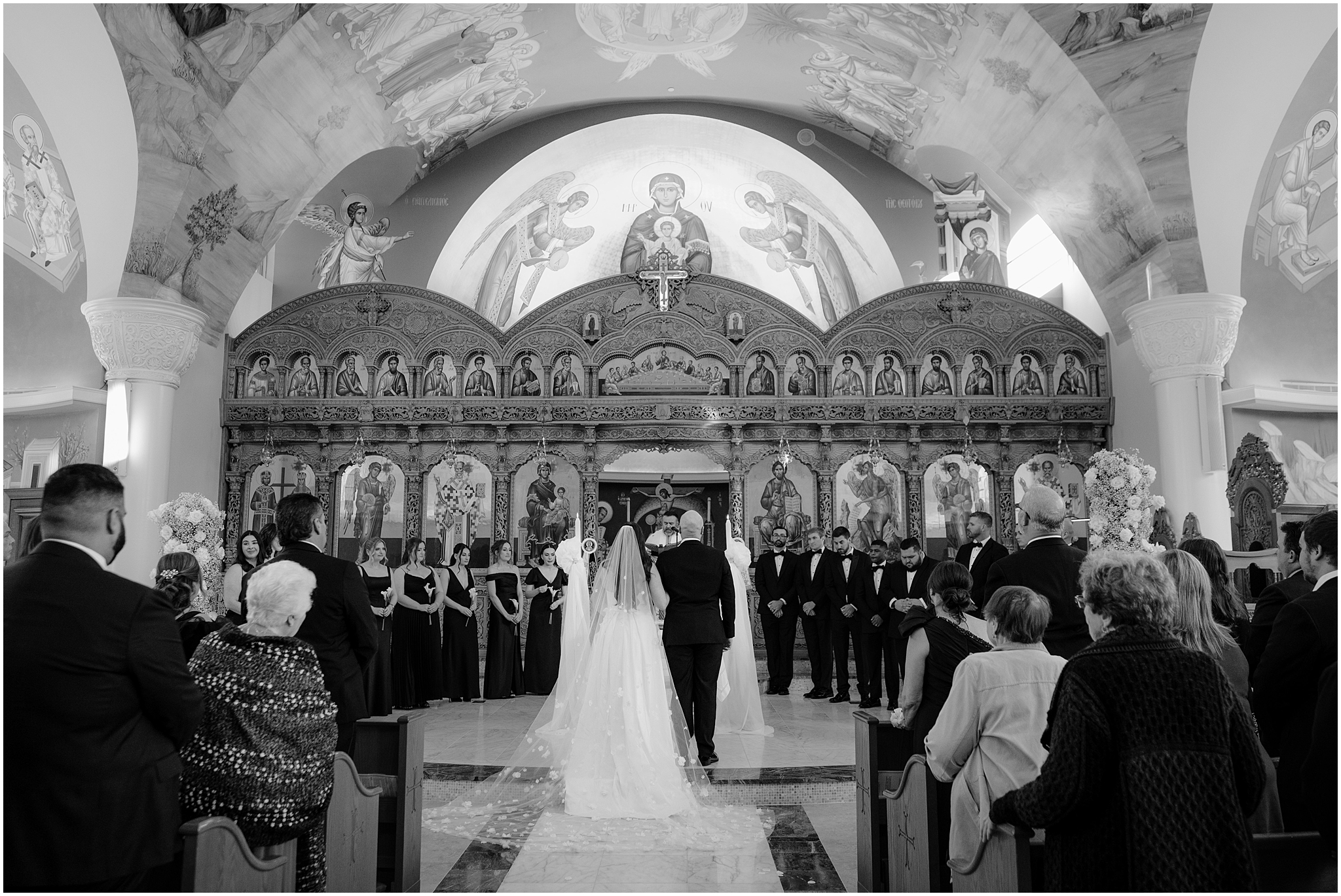 bride and father walk towards alter during traditional church wedding in New Jersey