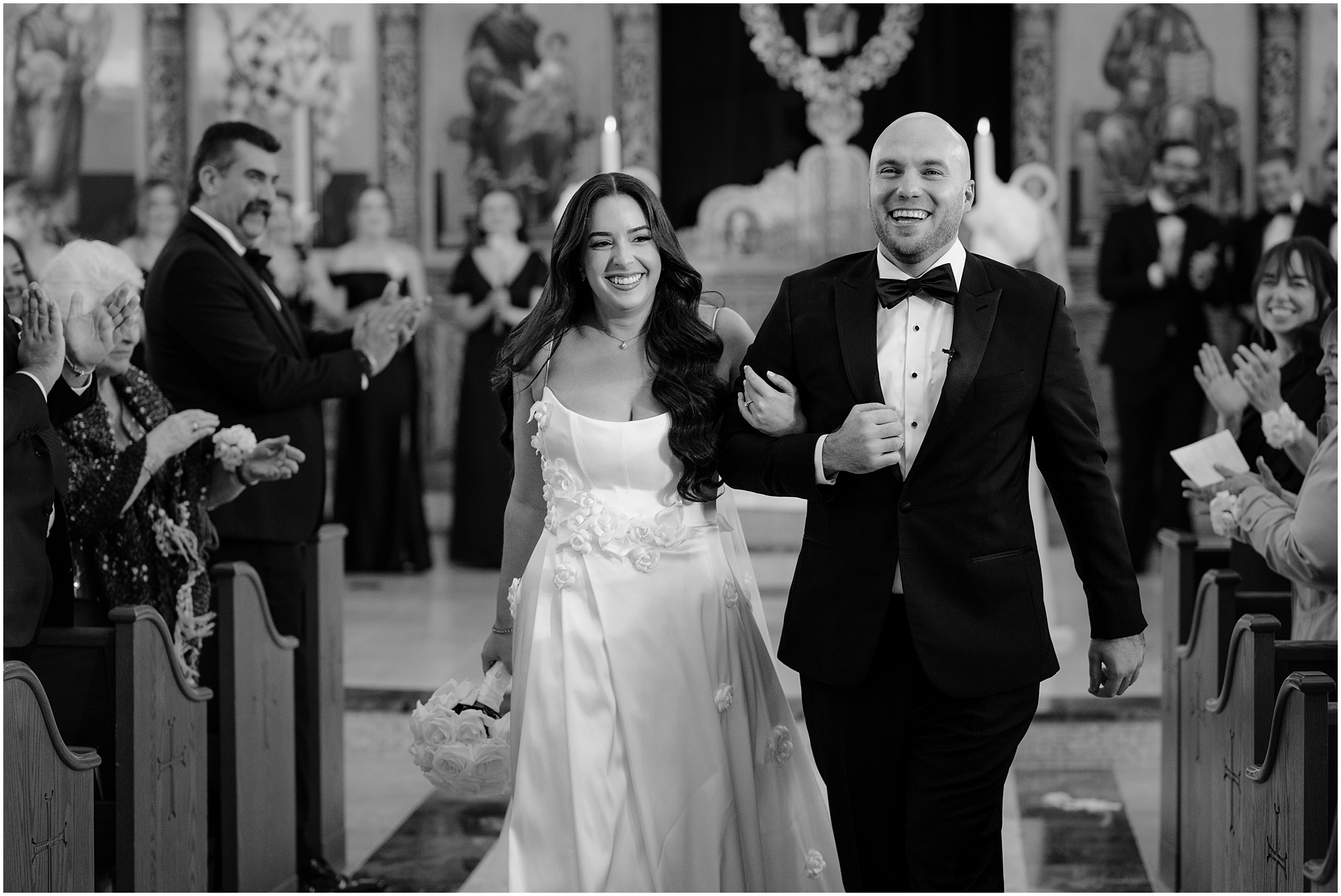 groom escorts bride up aisle after traditional church wedding in New Jersey