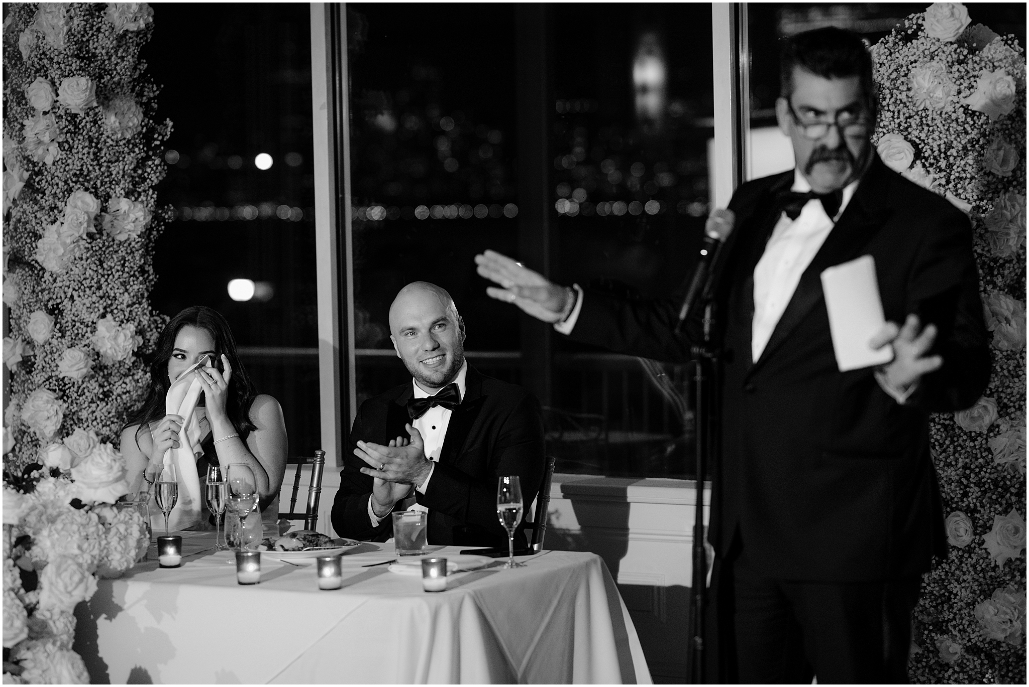 father gives speech during reception at the Liberty House Restaurant