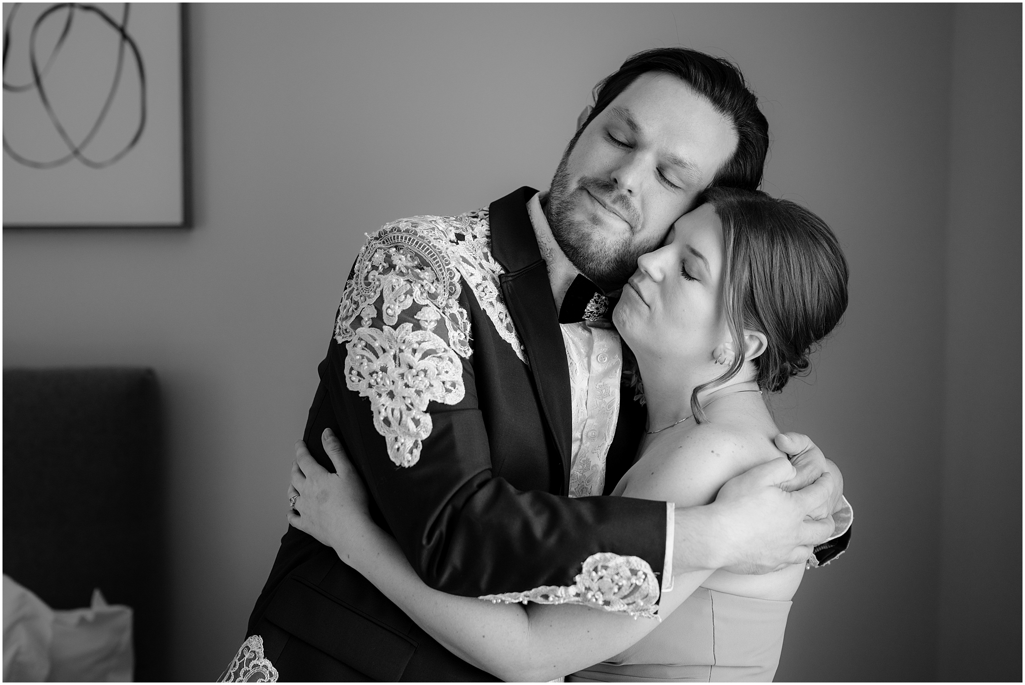 groom hugs sister during prep for Jersey City wedding