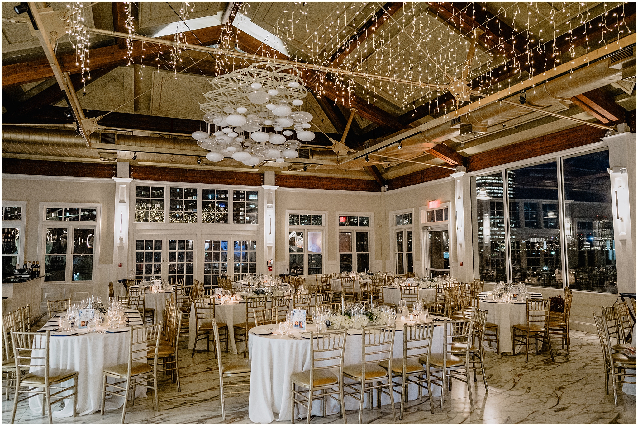 wedding reception with white and gold details at the Liberty House in Jersey City