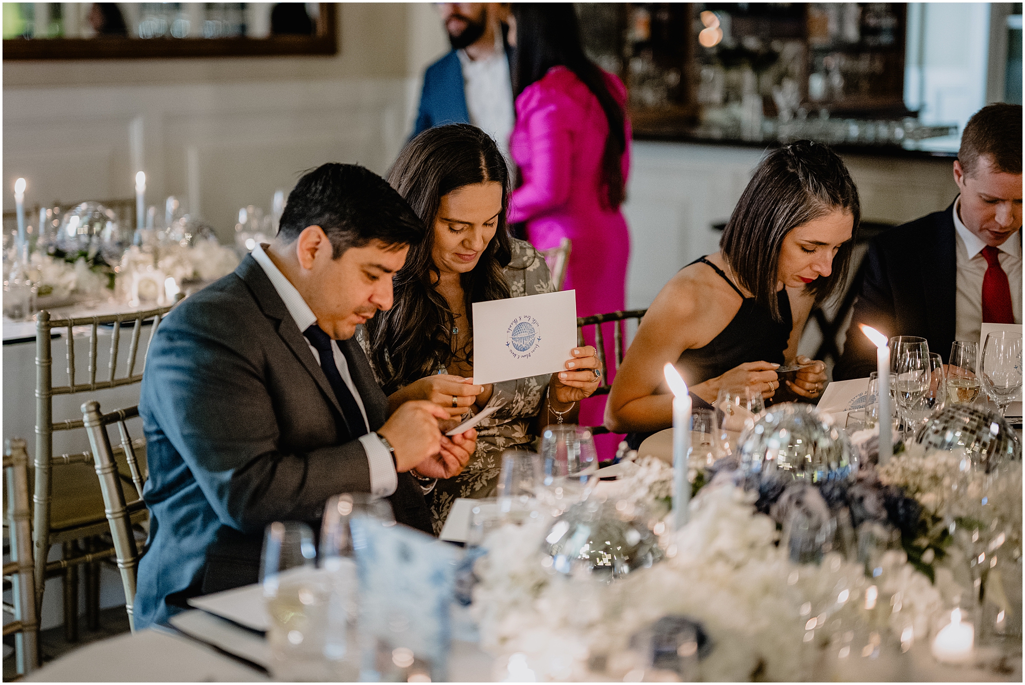 guests read letters from grooms on wedding day