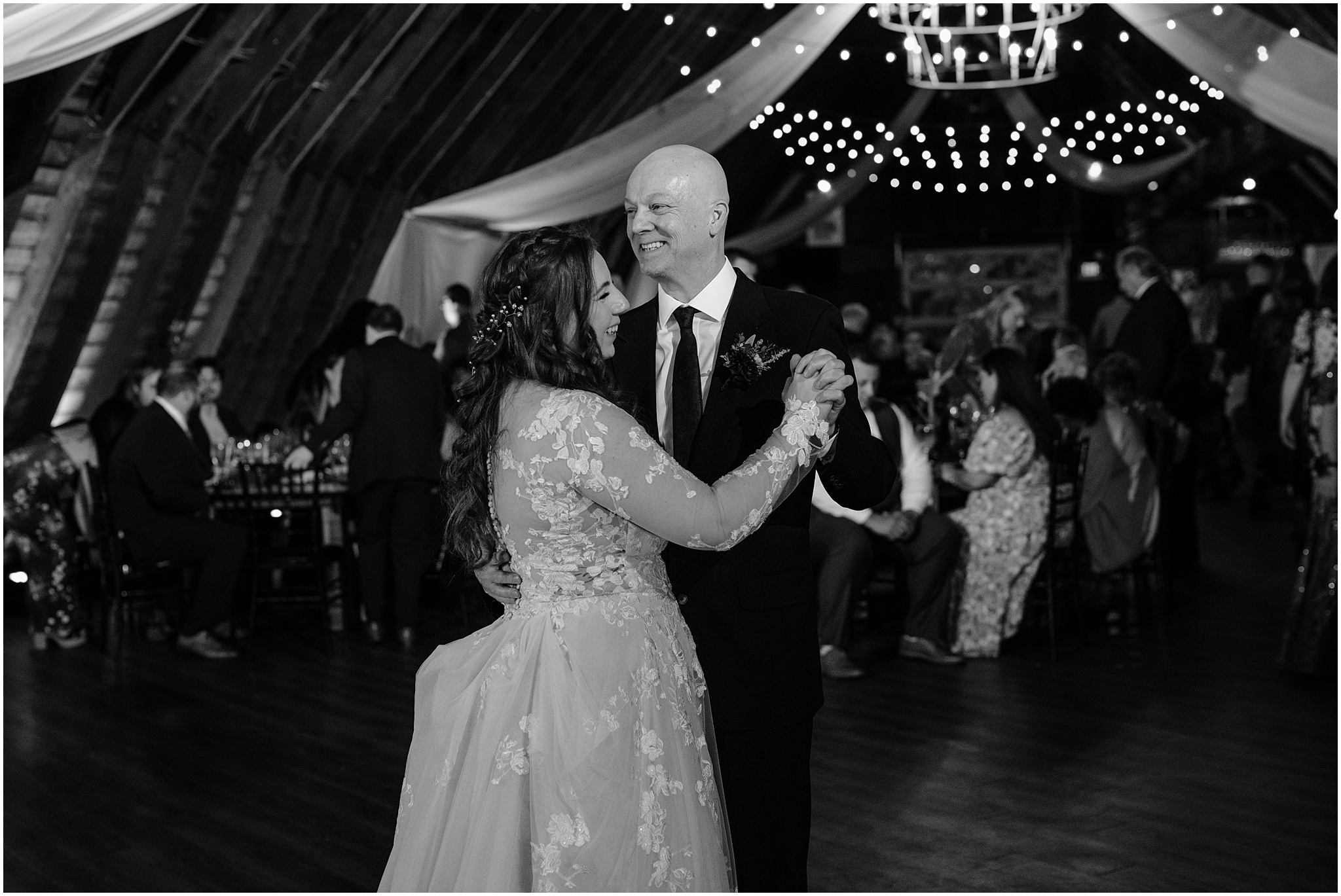 bride and father dance during wedding reception at the Barn at Perona Farms