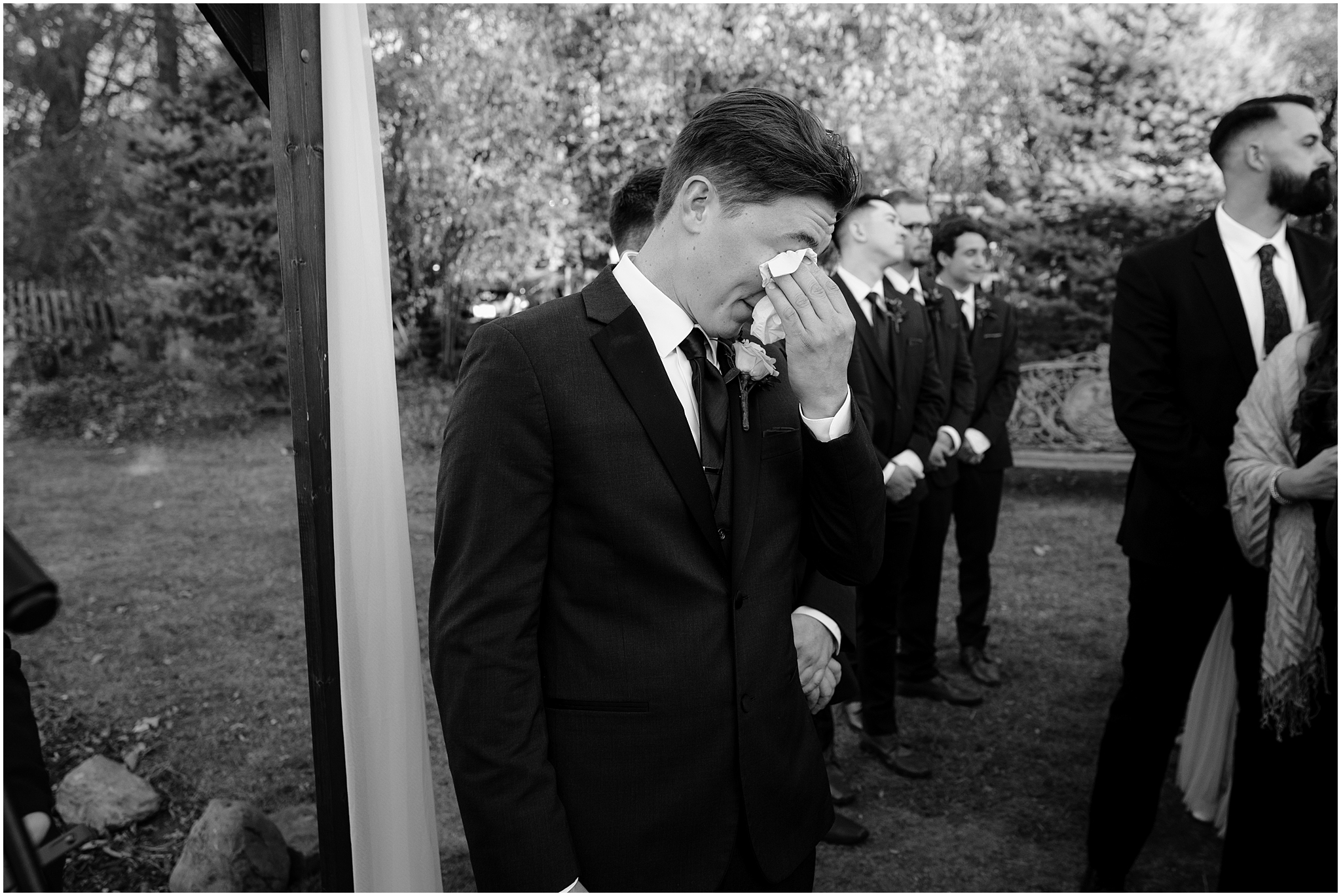 groom cries at start of wedding ceremony at the Feast at Round Hill