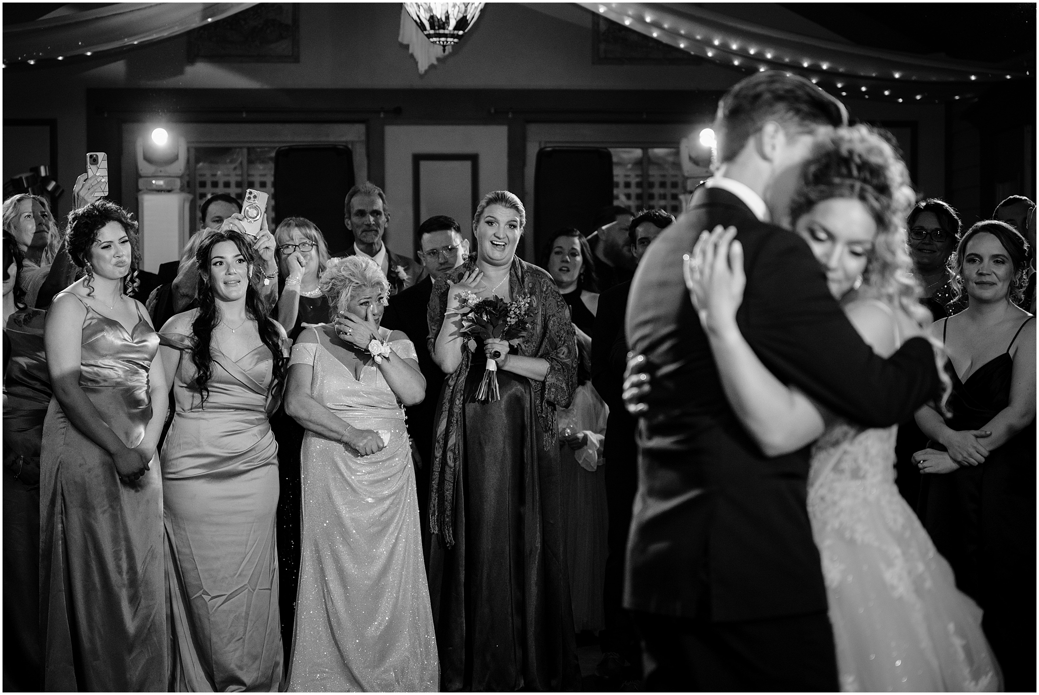 mother cries watching bride and groom dance during wedding reception at the Feast at Round Hill