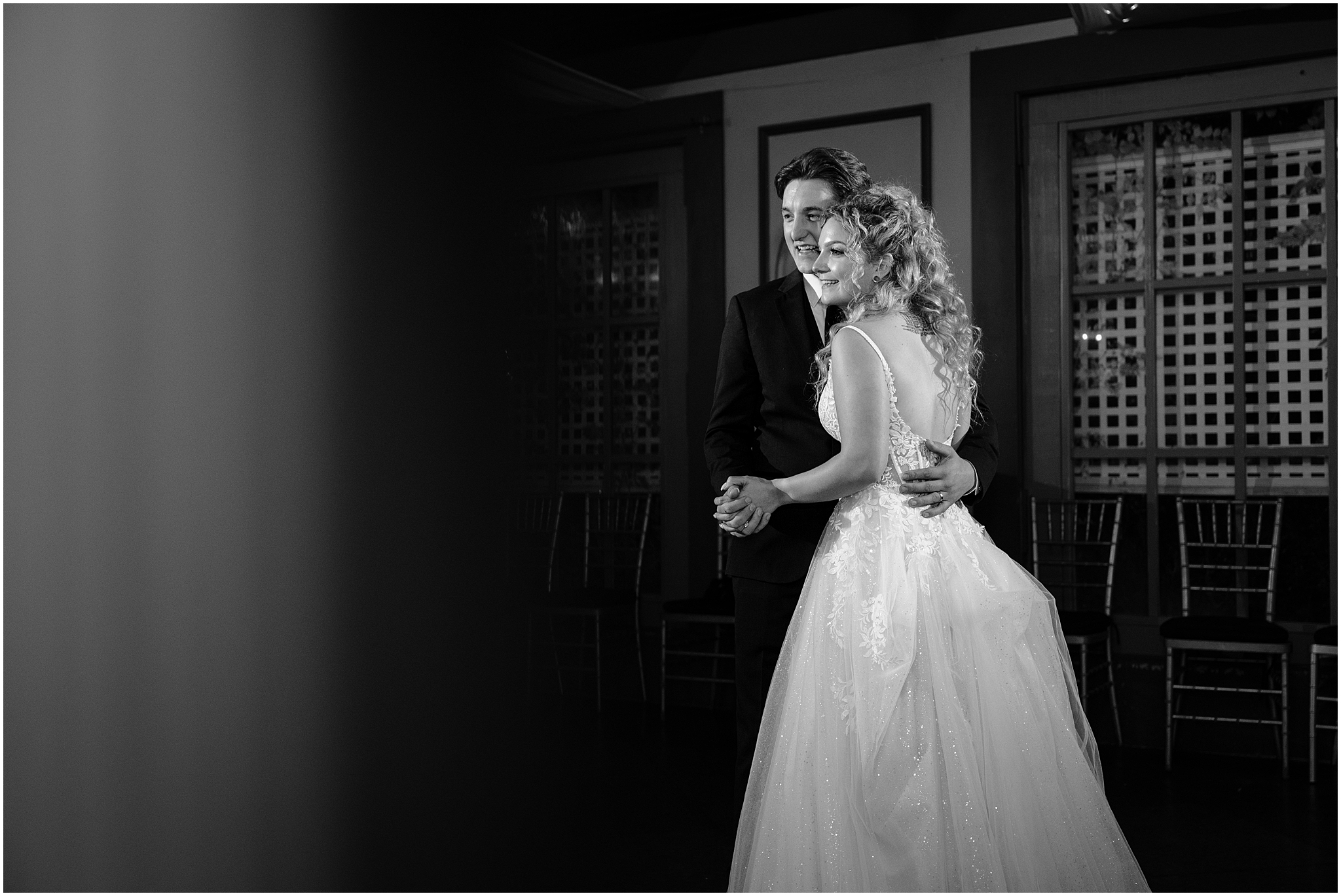 bride and groom hug close dancing together at wedding reception at the Feast at Round Hill