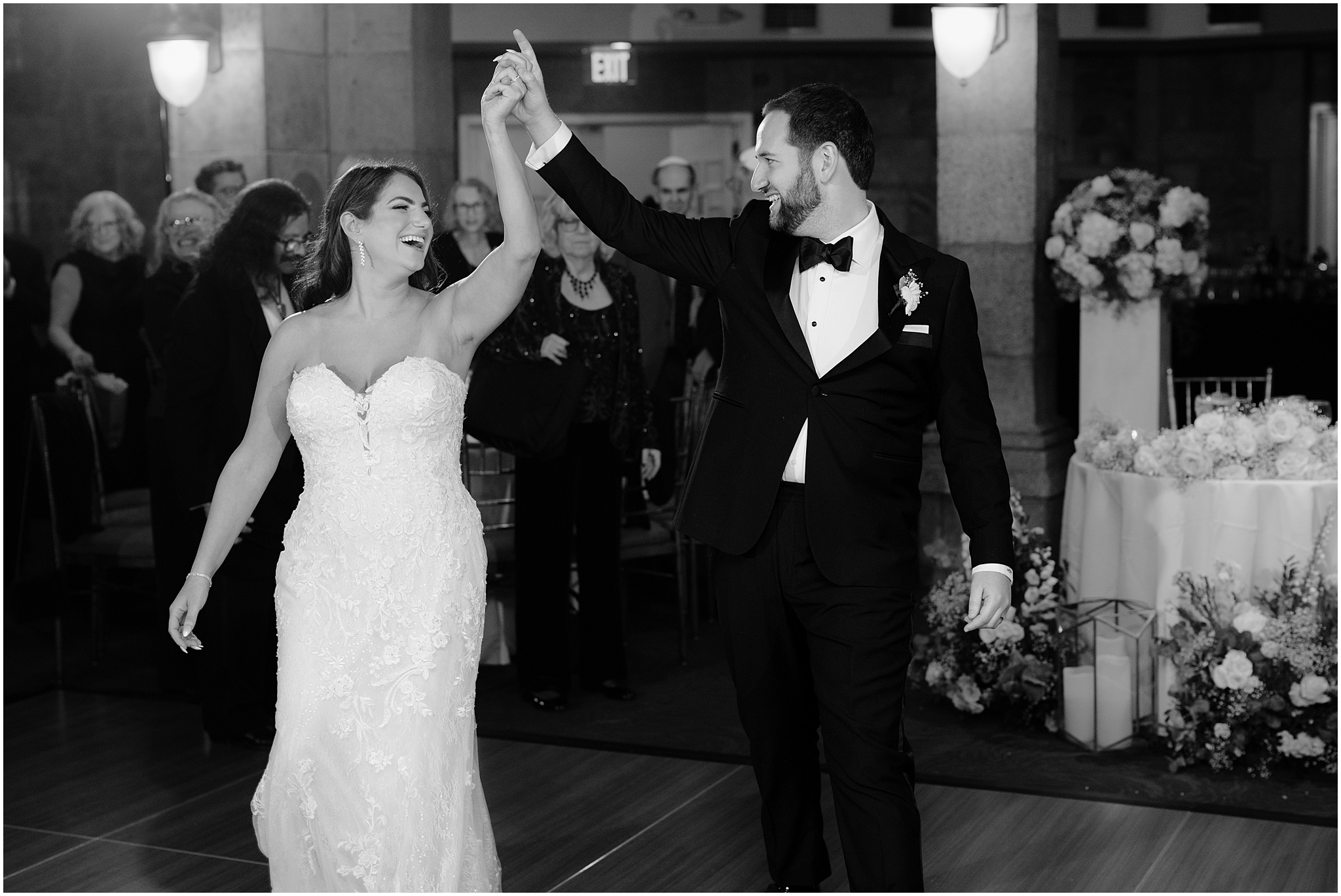 bride and groom hold hands walking into Tarrytown NY wedding reception