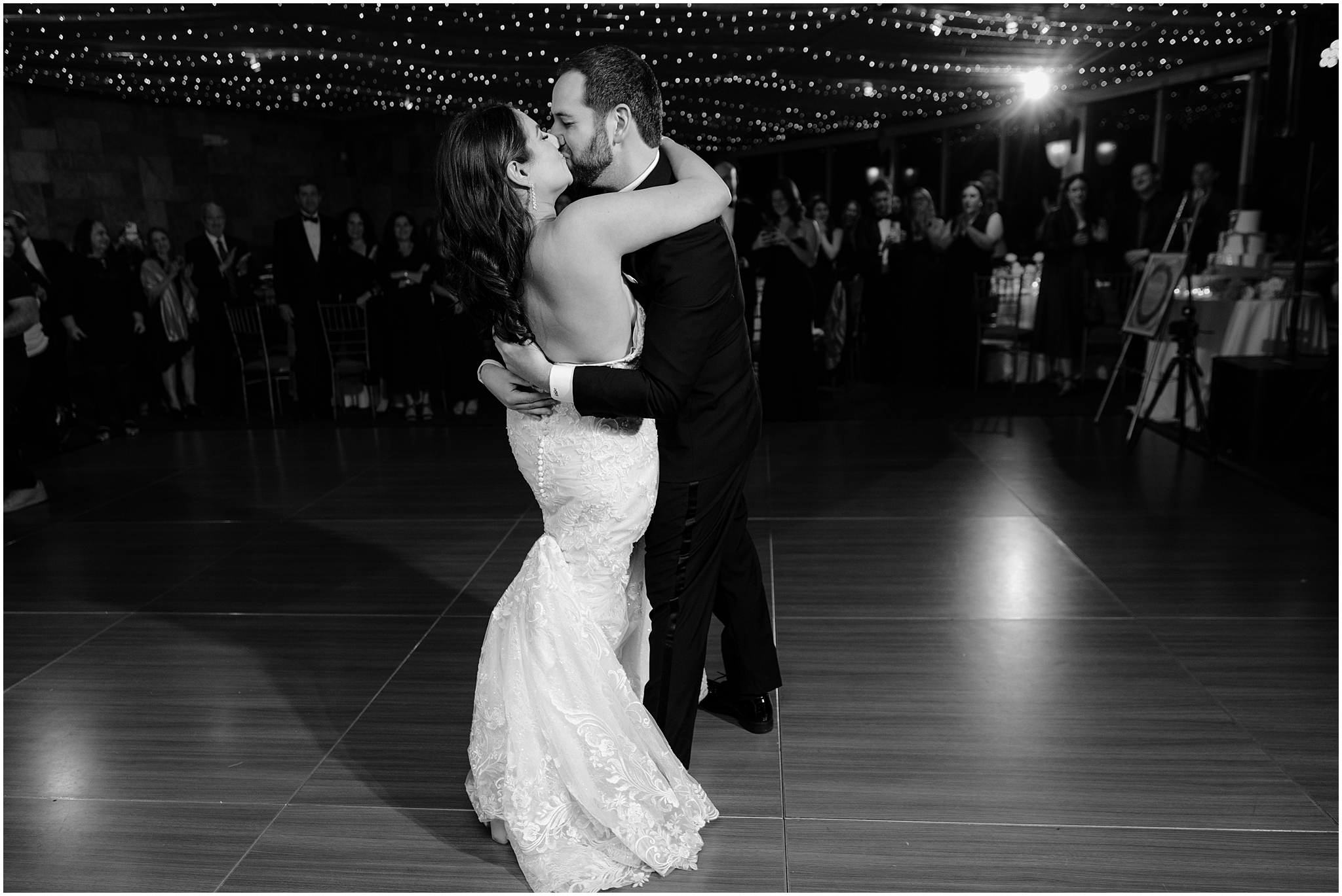 newlyweds kiss on dance floor during Tarrytown NY wedding reception