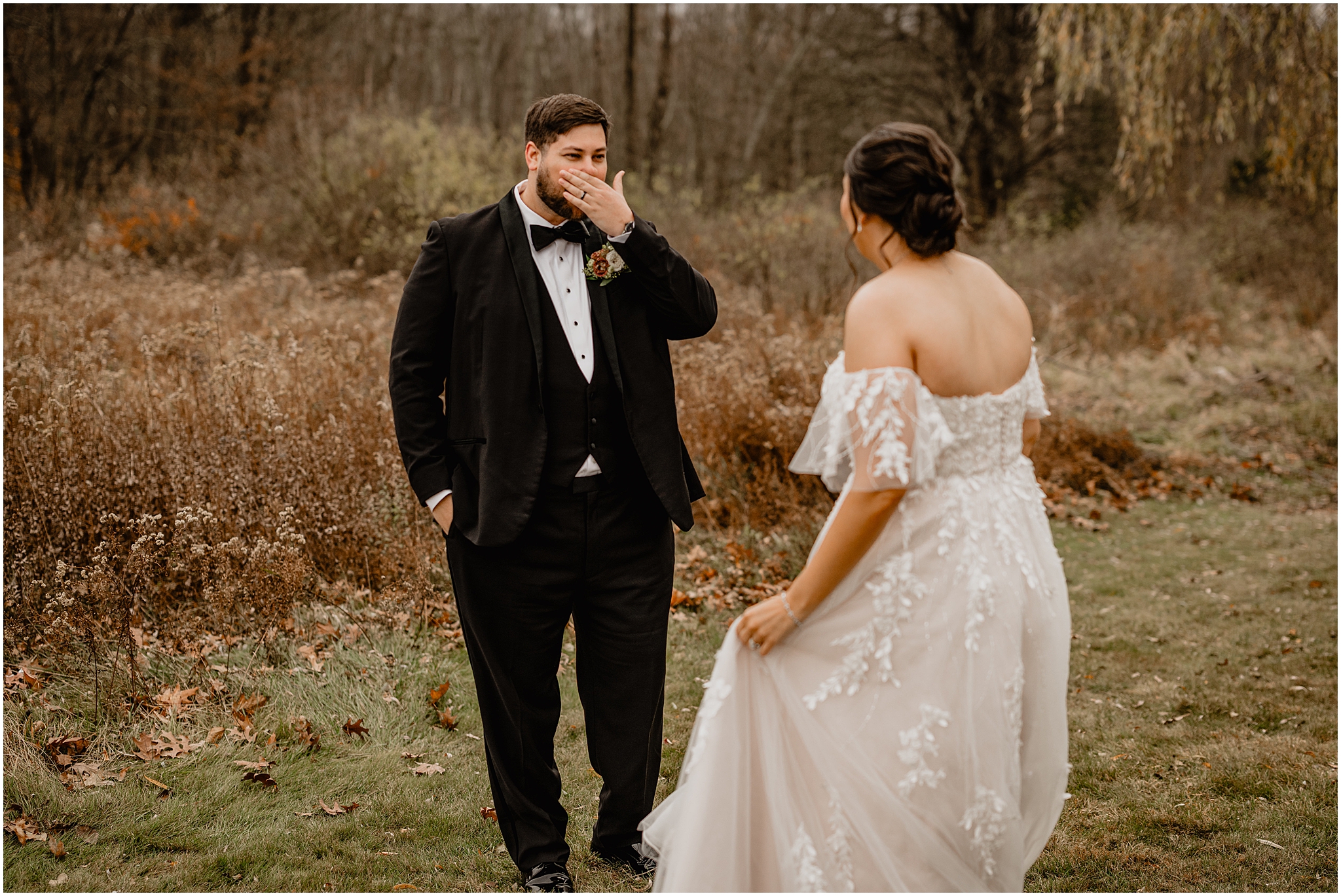 groom gasps covering his mouth during first look with bride in field at the Perona Farms Reserve