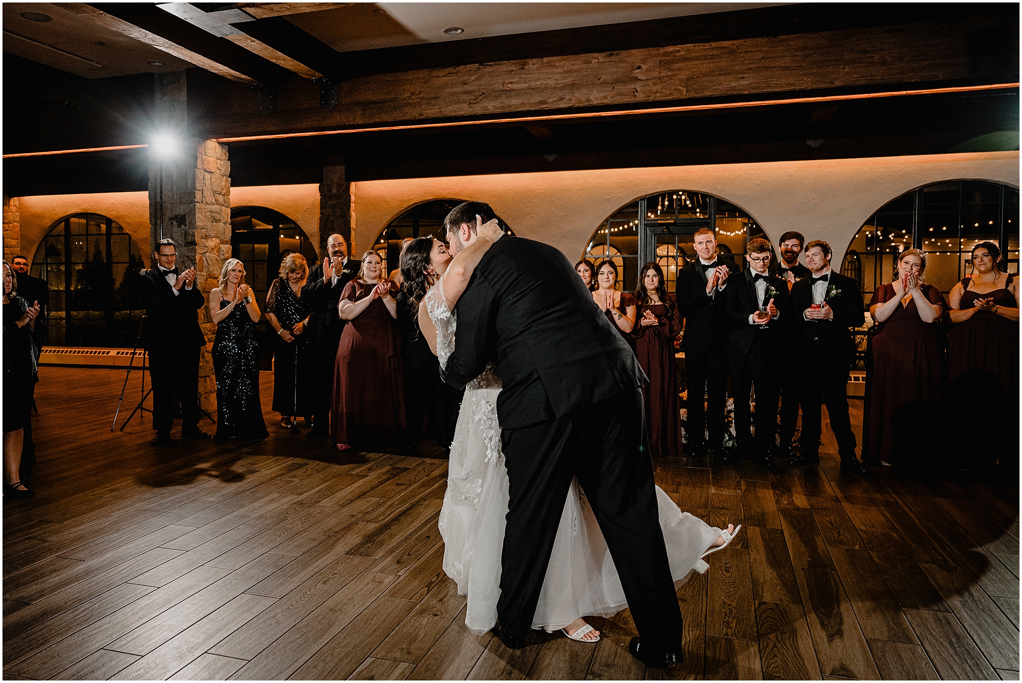 bride and groom kiss on dance floor during Andover NJ wedding reception