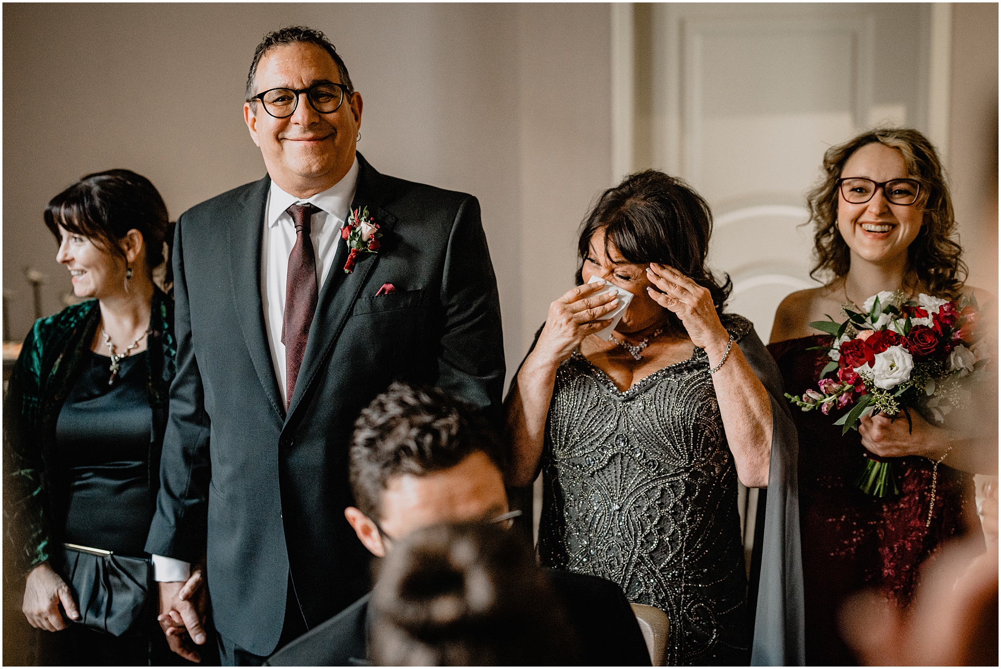 mother wipes tears away during ceremony at Cescaphe's Switch House in Philadelphia PA