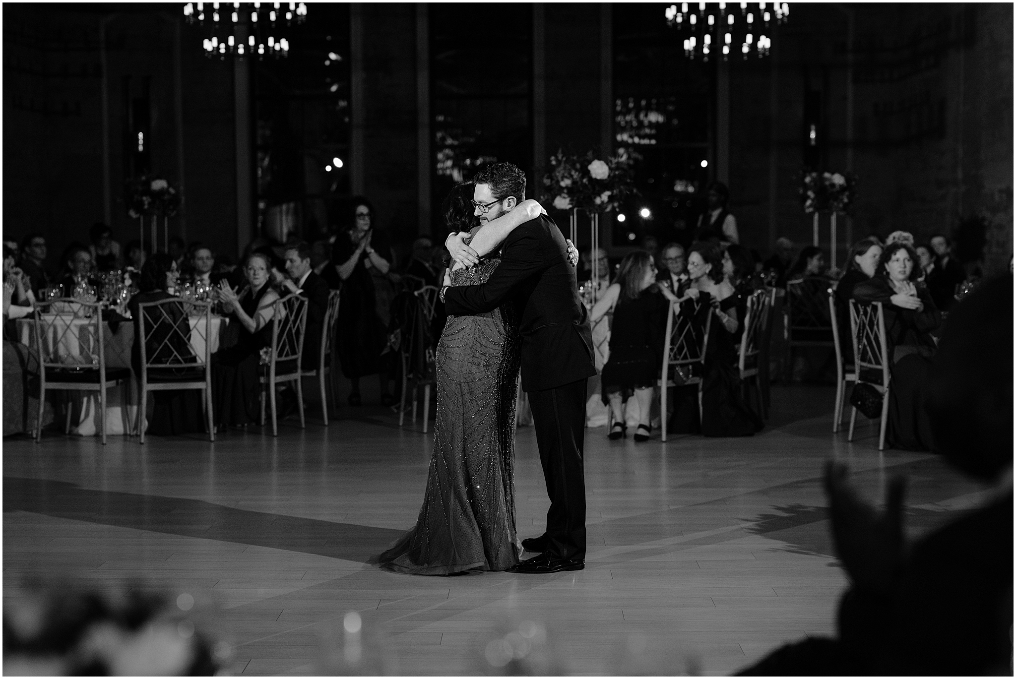 groom and mother dance during Philadelphia PA wedding reception in the ballroom