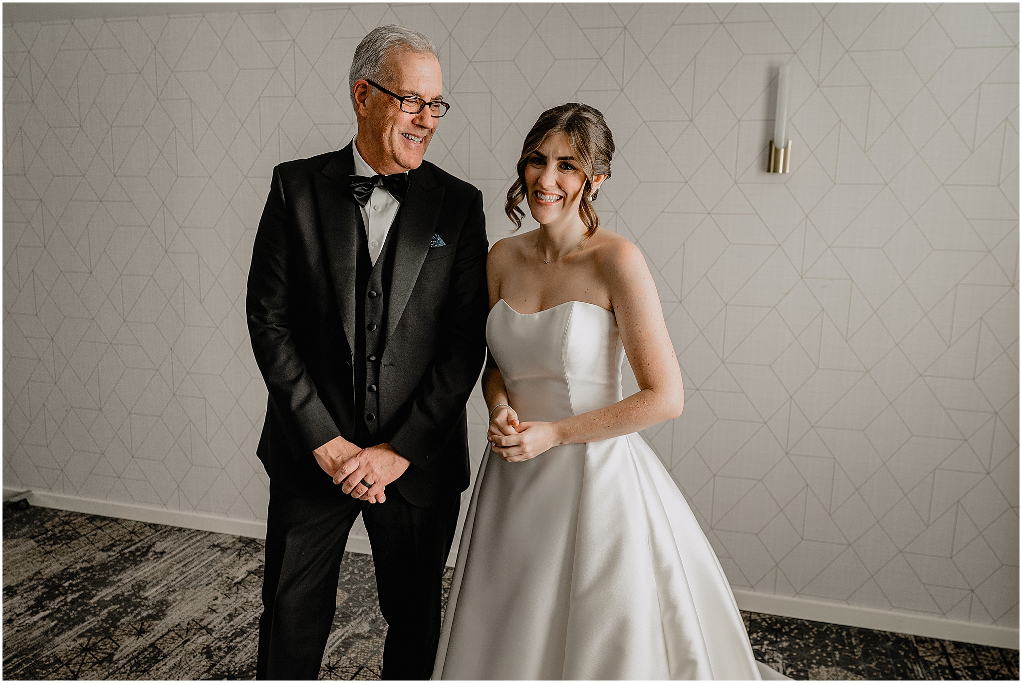 bride leans against dad during first look at Hudson Valley hotel
