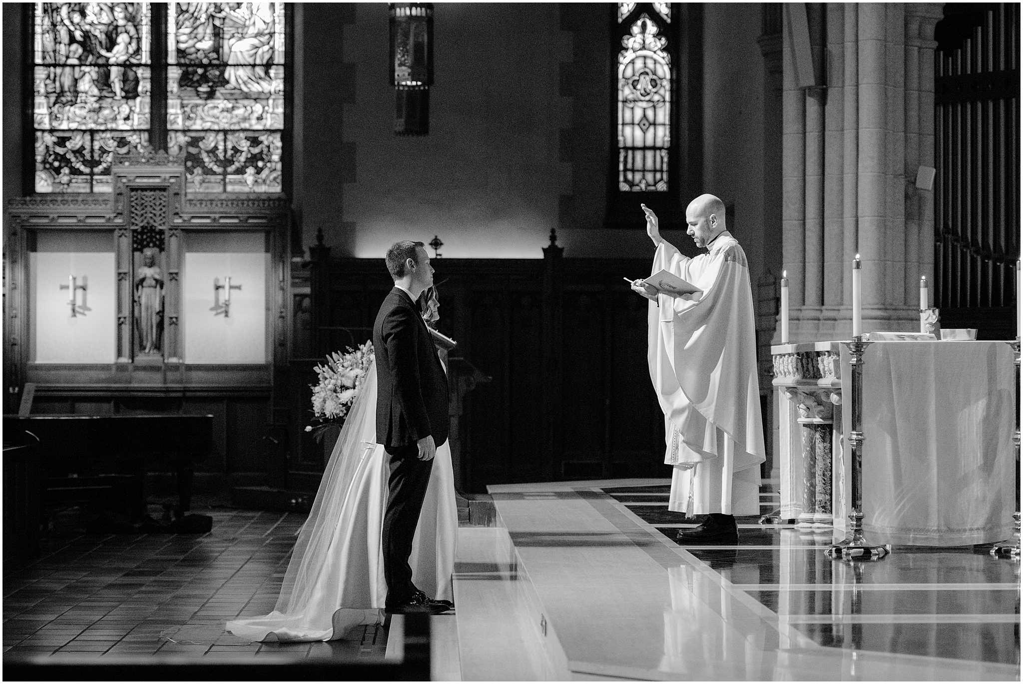 priest performs traditional Catholic wedding ceremony inside New York Church