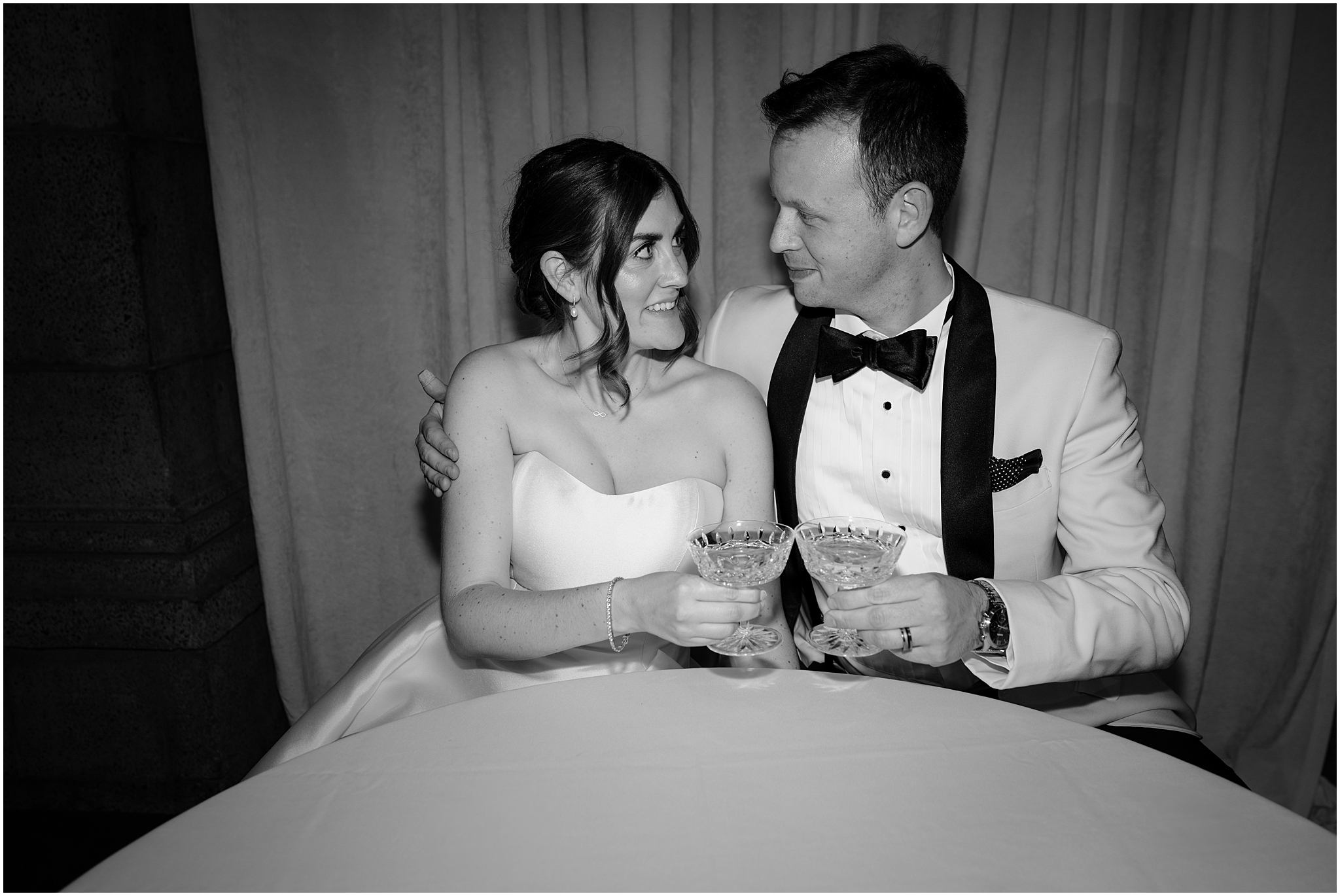 newlyweds toast drinks together during Tarrytown NY wedding reception
