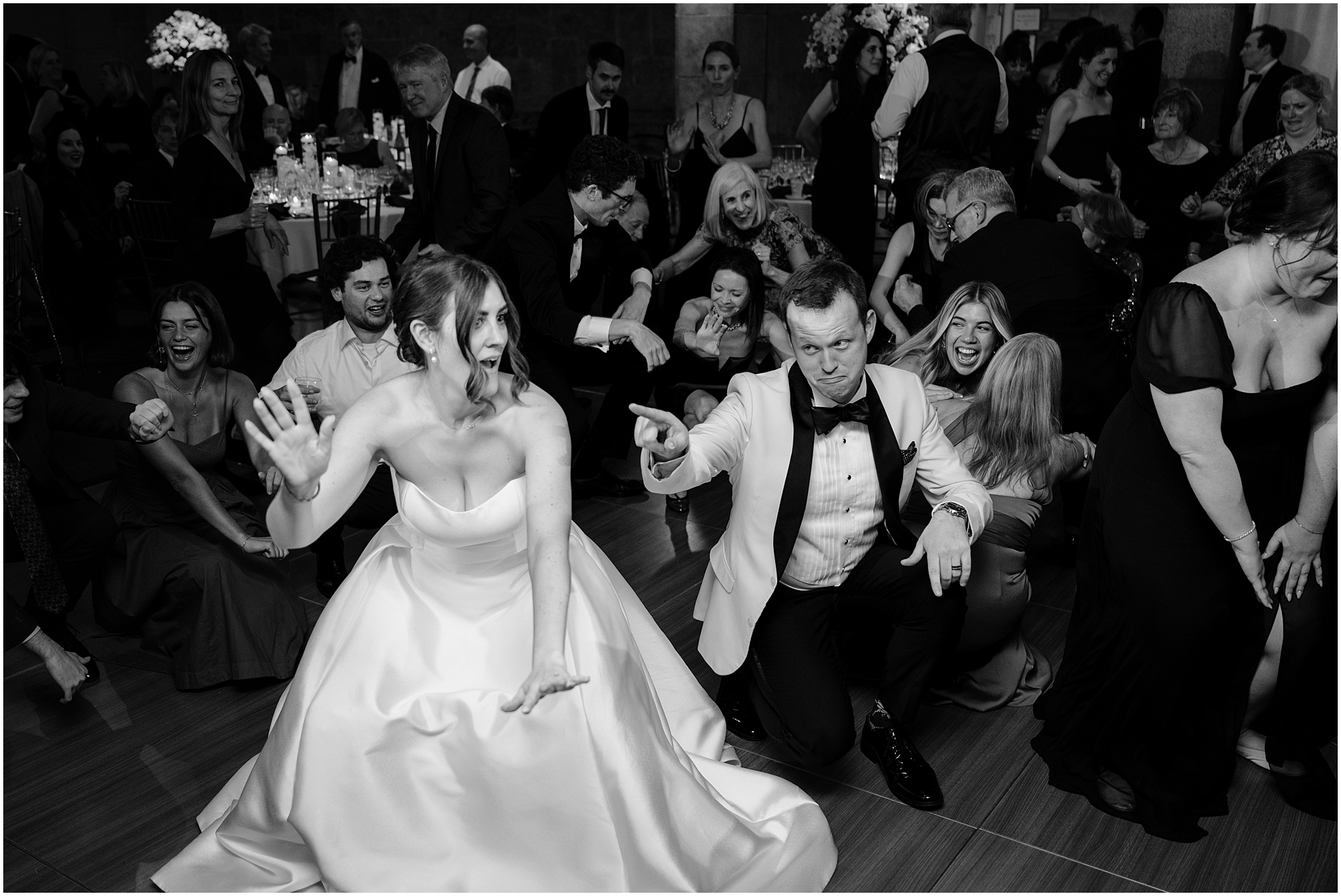 bride and groom dance with wedding guests during Tarrytown NY wedding reception