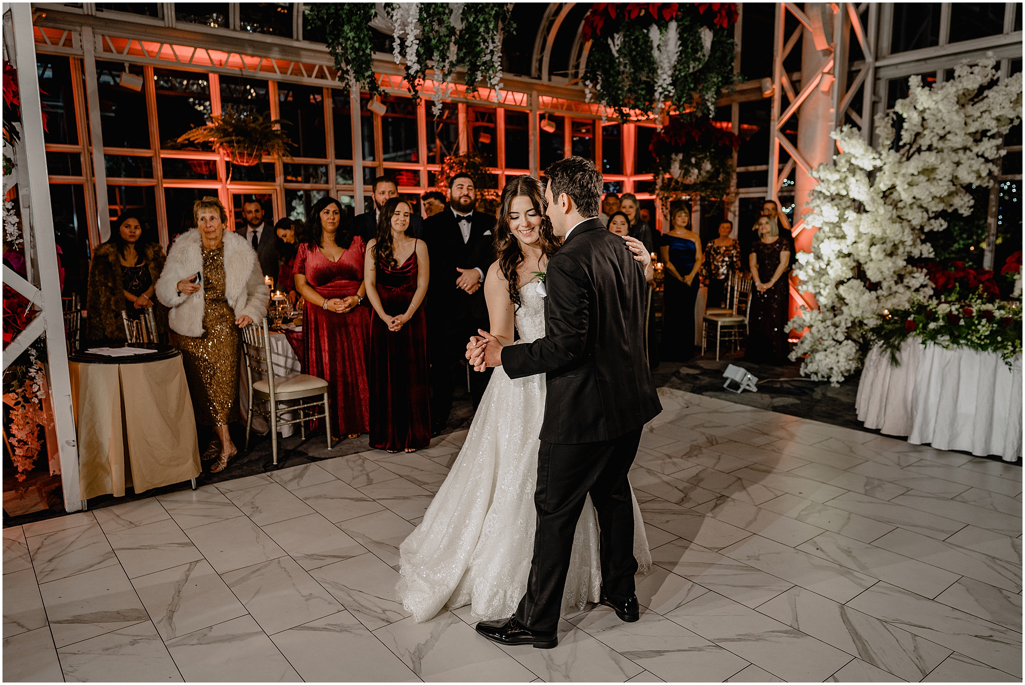 bride and groom dance on marble floor at wedding reception in Morristown NJ