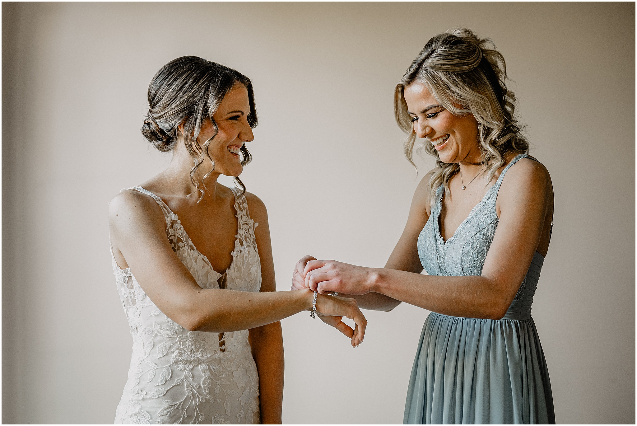 Bride getting ready before her winter wedding at Perona Farms Refinery.