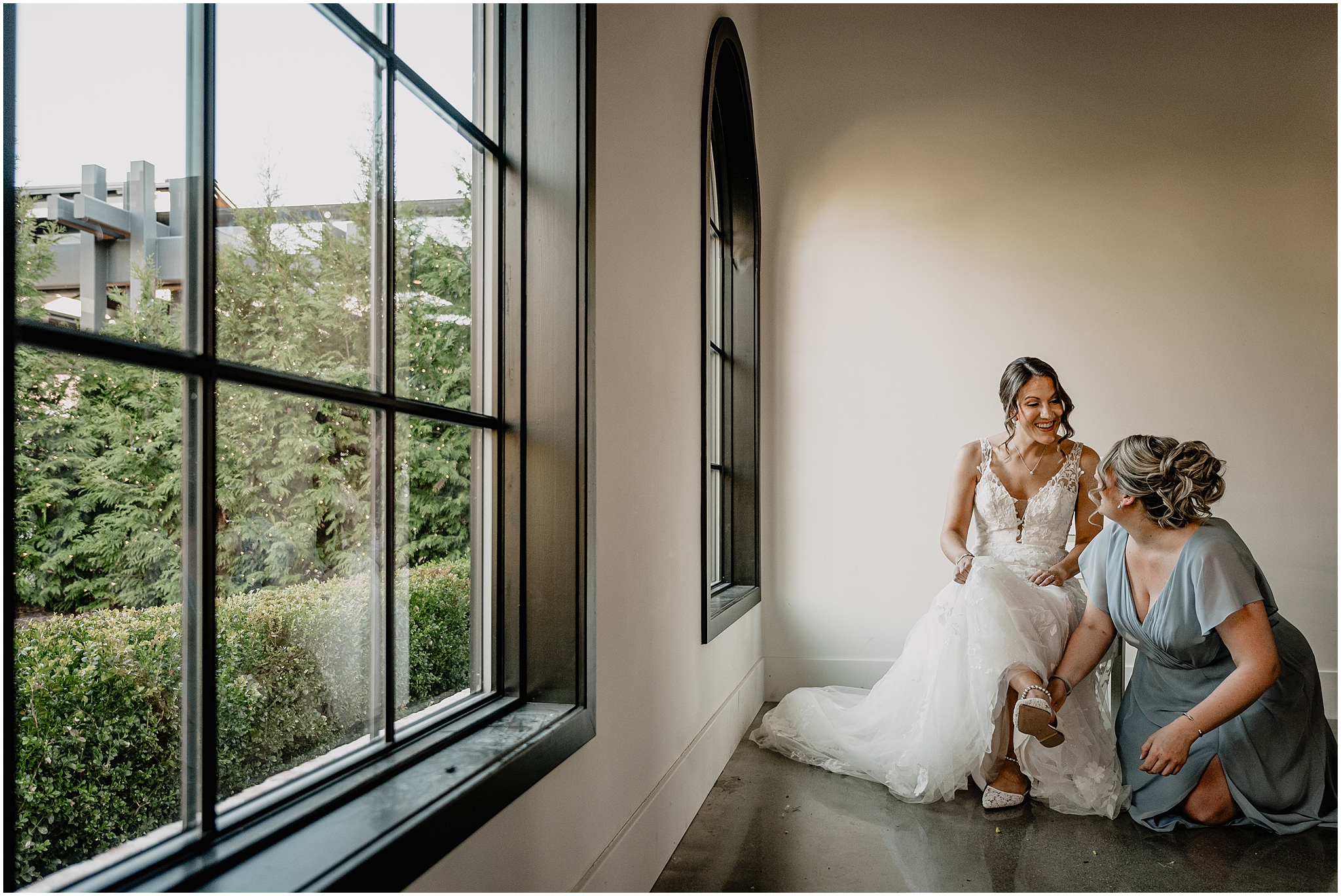 Bride getting ready before her winter wedding at Perona Farms Refinery.