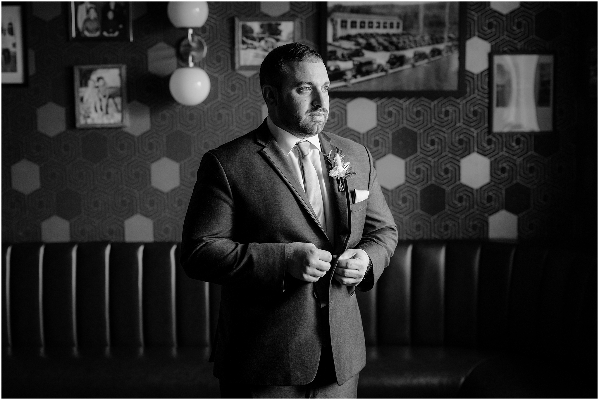 Groom getting ready before his winter wedding at Perona Farms Refinery.