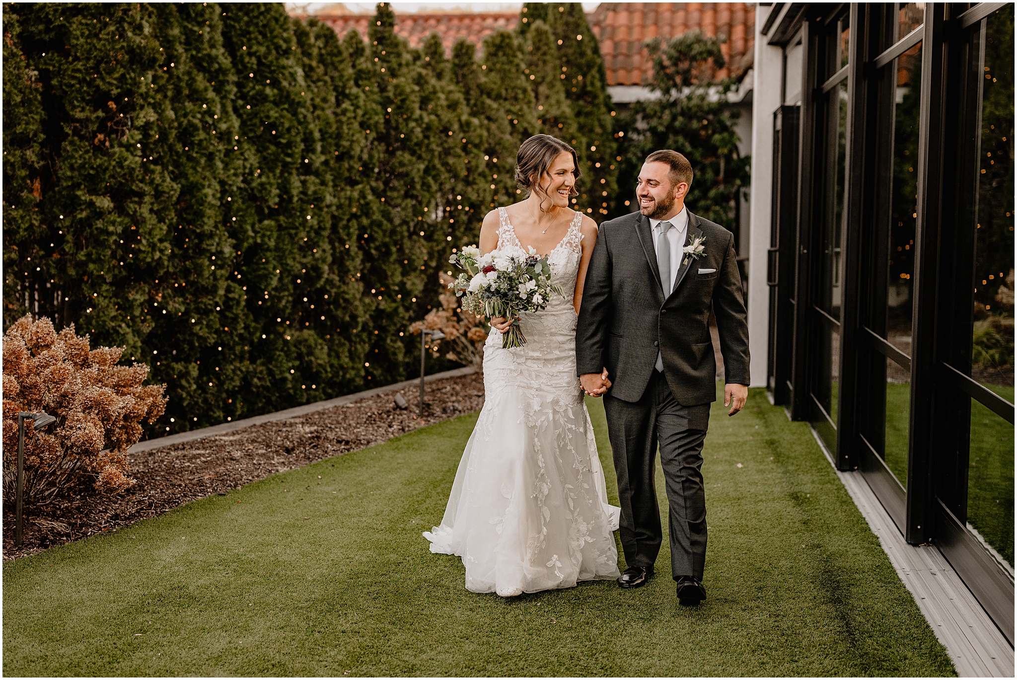 Couple before their winter wedding at Perona Farms Refinery.