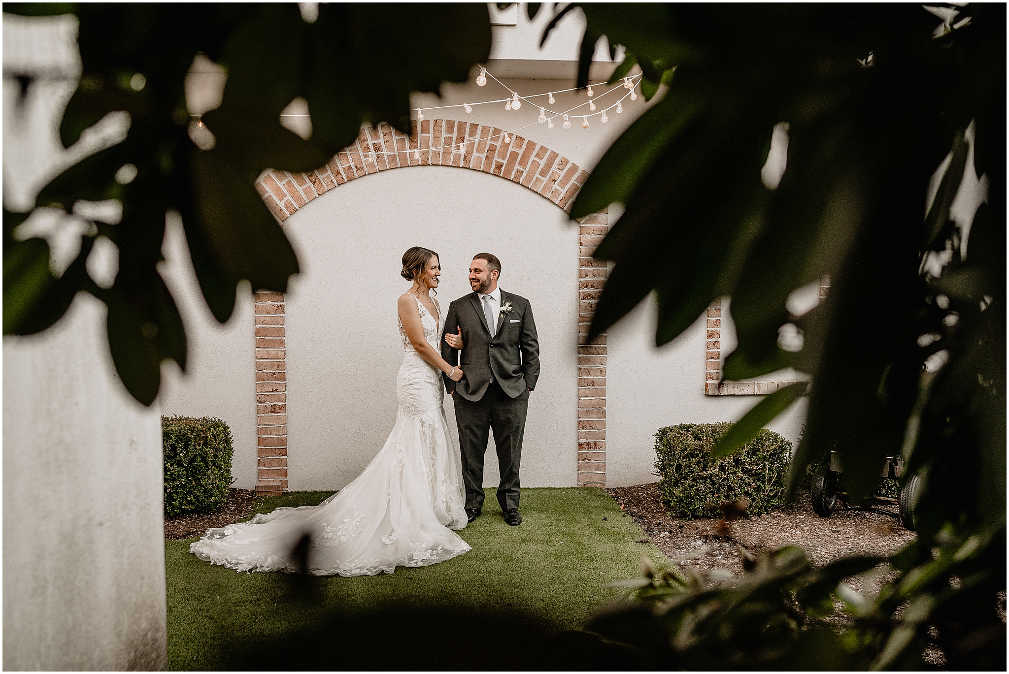 Couple before their winter wedding at Perona Farms Refinery.