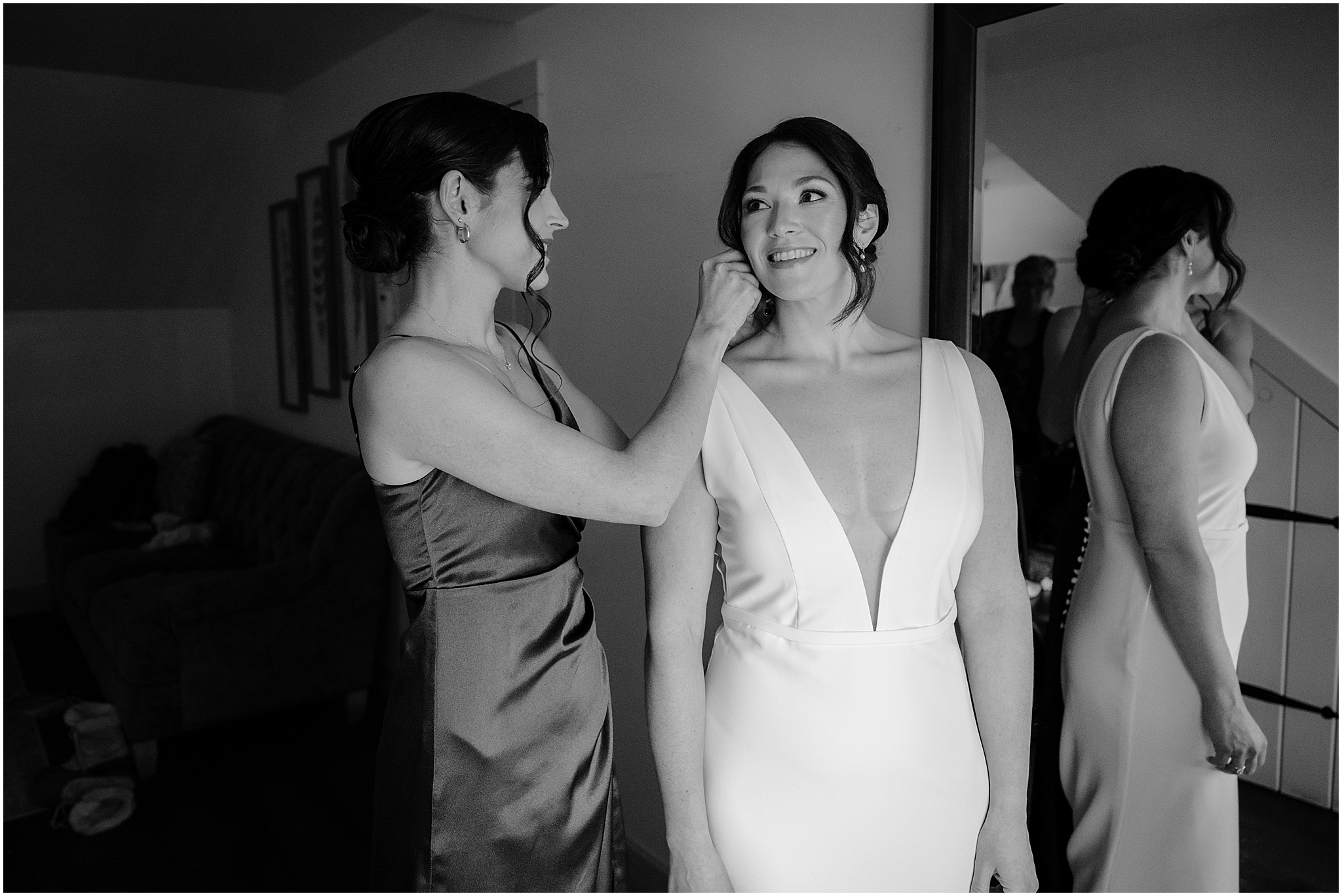 Bride getting ready before her winter wedding at The Barn at Perona Farms.