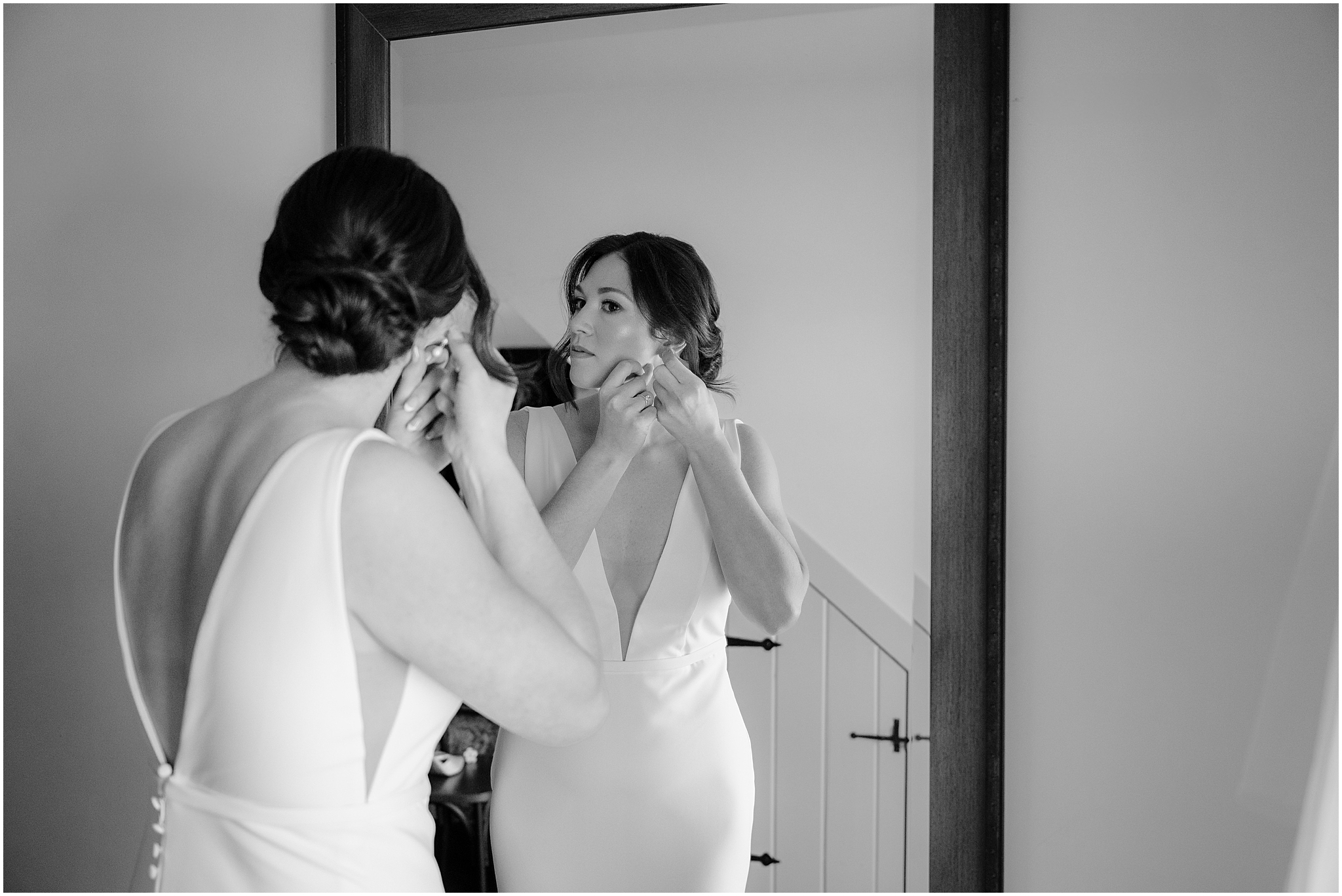 Bride getting ready before her winter wedding at The Barn at Perona Farms.