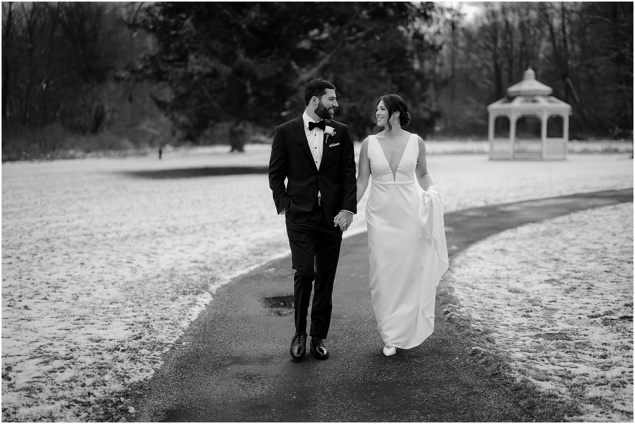 Couple before their winter wedding at The Barn at Perona Farms.