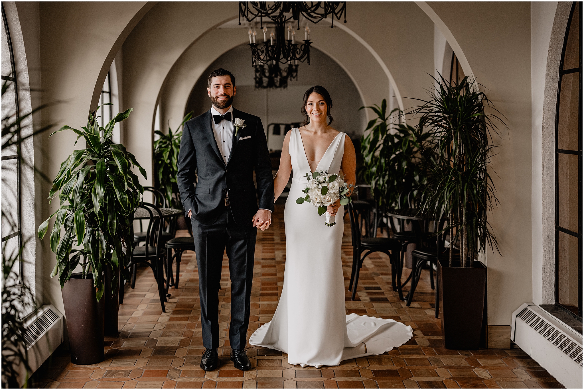 Couple before their winter wedding at The Barn at Perona Farms.