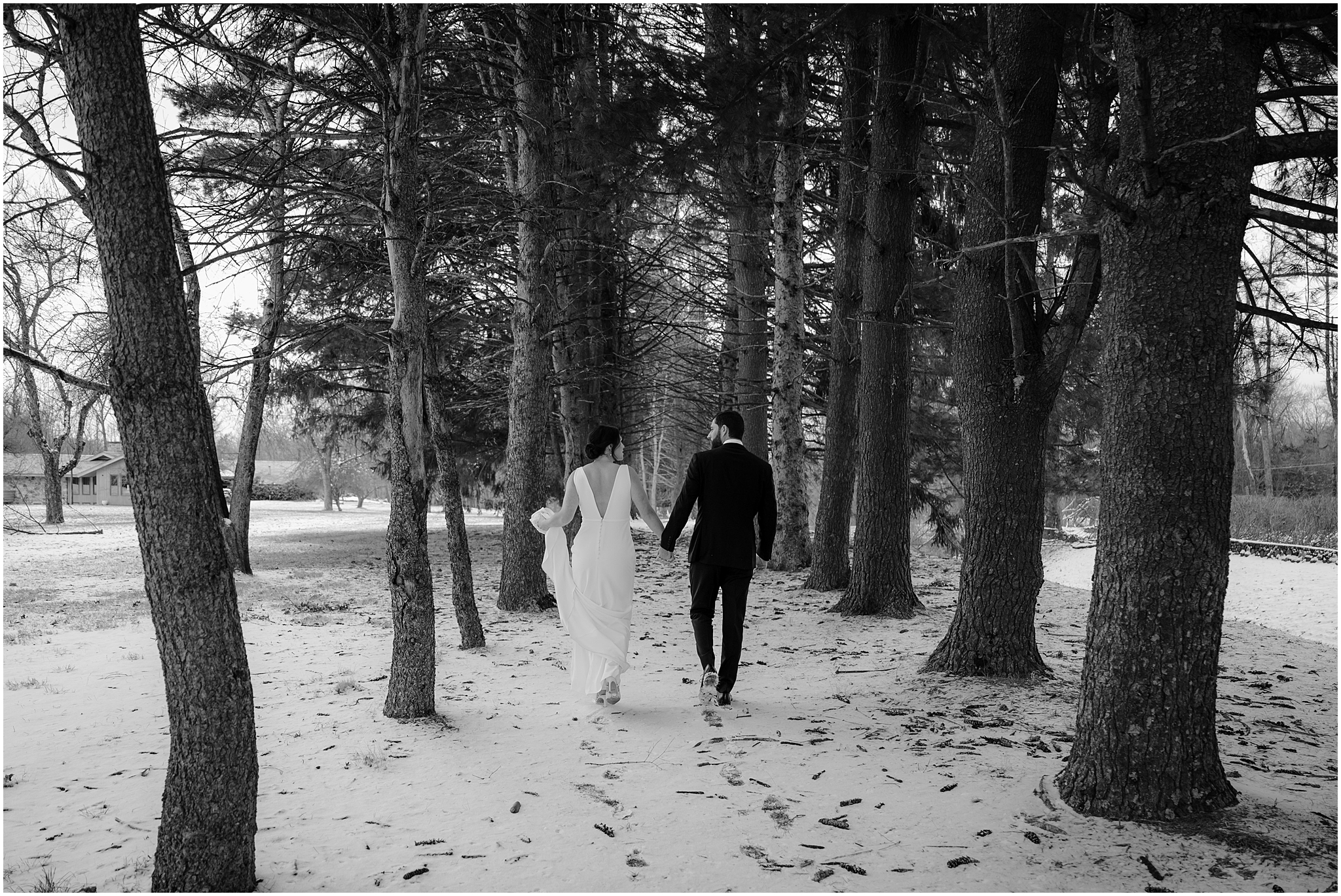 Couple before their winter wedding at The Barn at Perona Farms.
