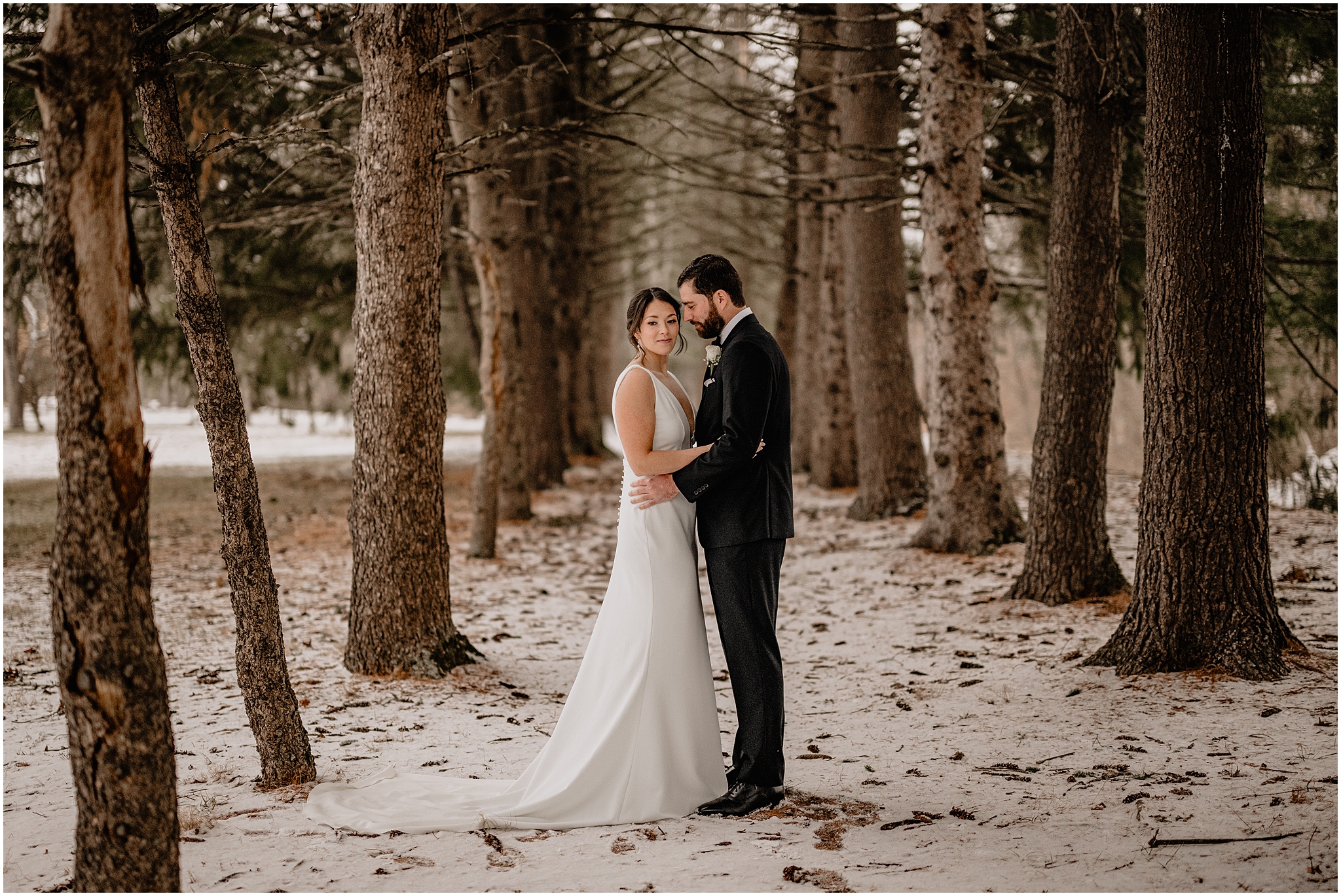 Couple before their winter wedding at The Barn at Perona Farms.