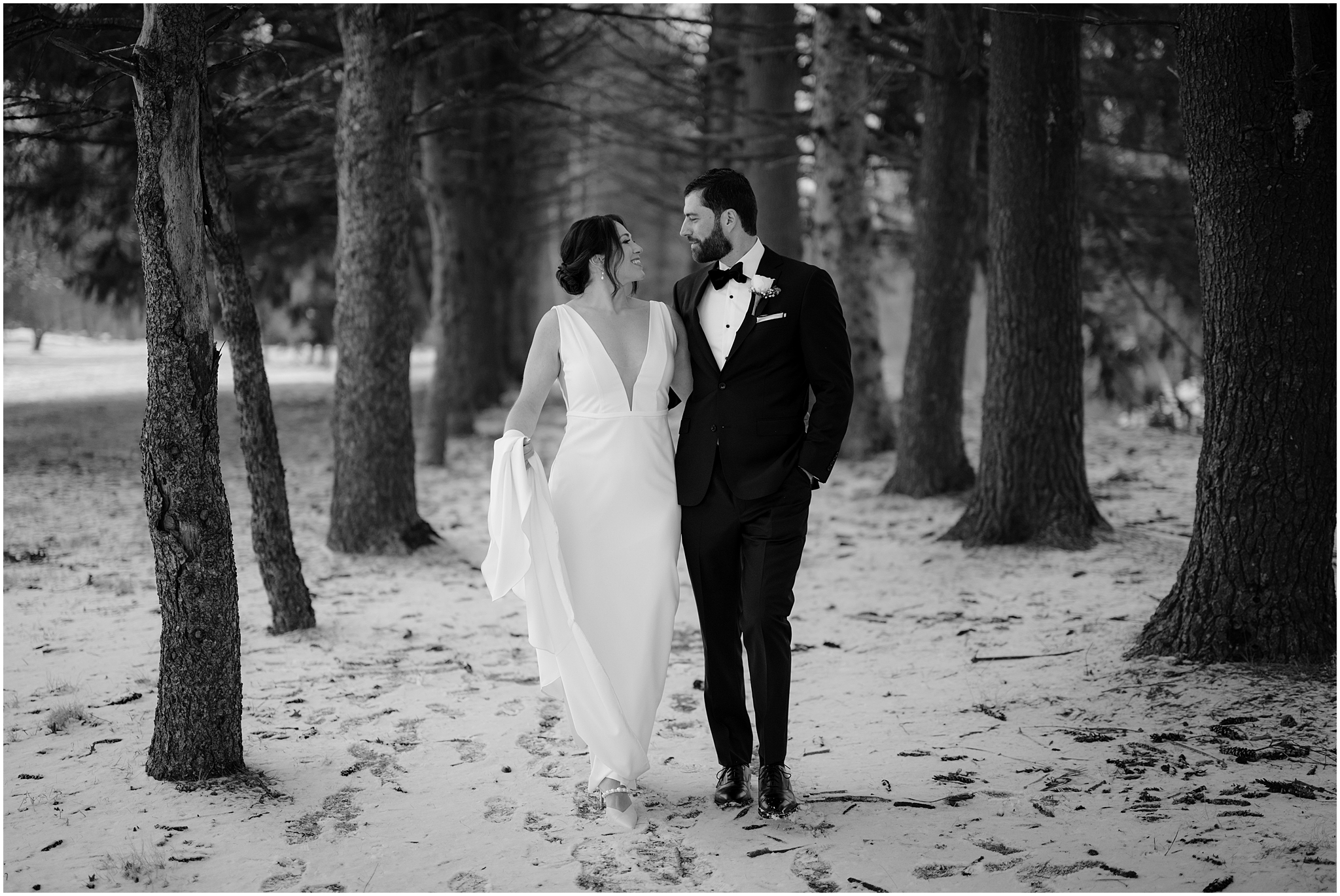 Couple before their winter wedding at The Barn at Perona Farms.
