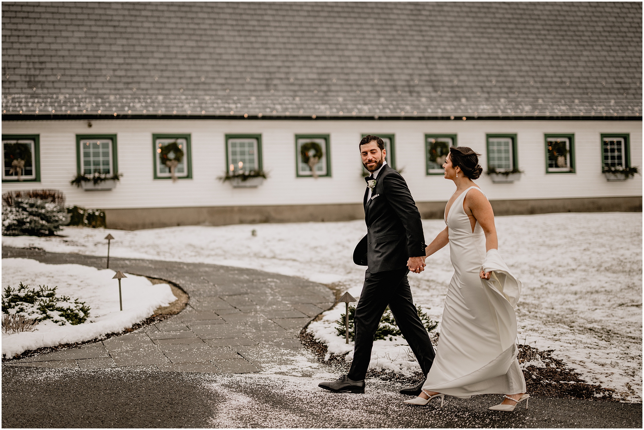 Couple before their winter wedding at The Barn at Perona Farms.