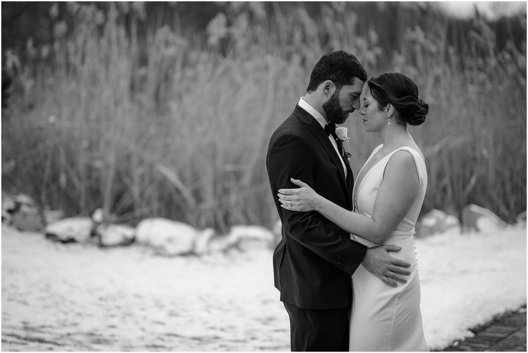 Couple before their winter wedding at The Barn at Perona Farms.