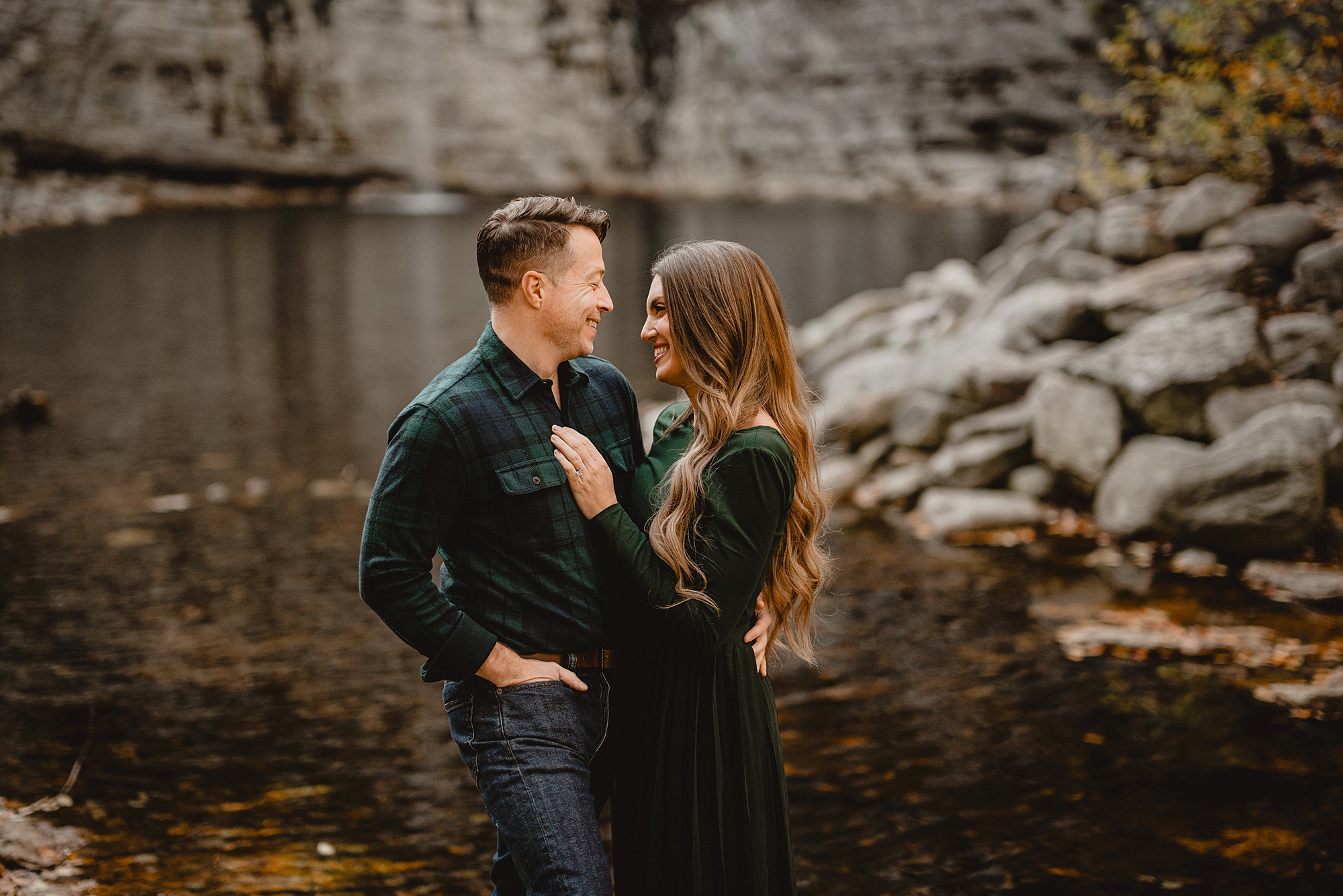 engaged couple looks at each other during their Lake Minnewaska Engagement Session