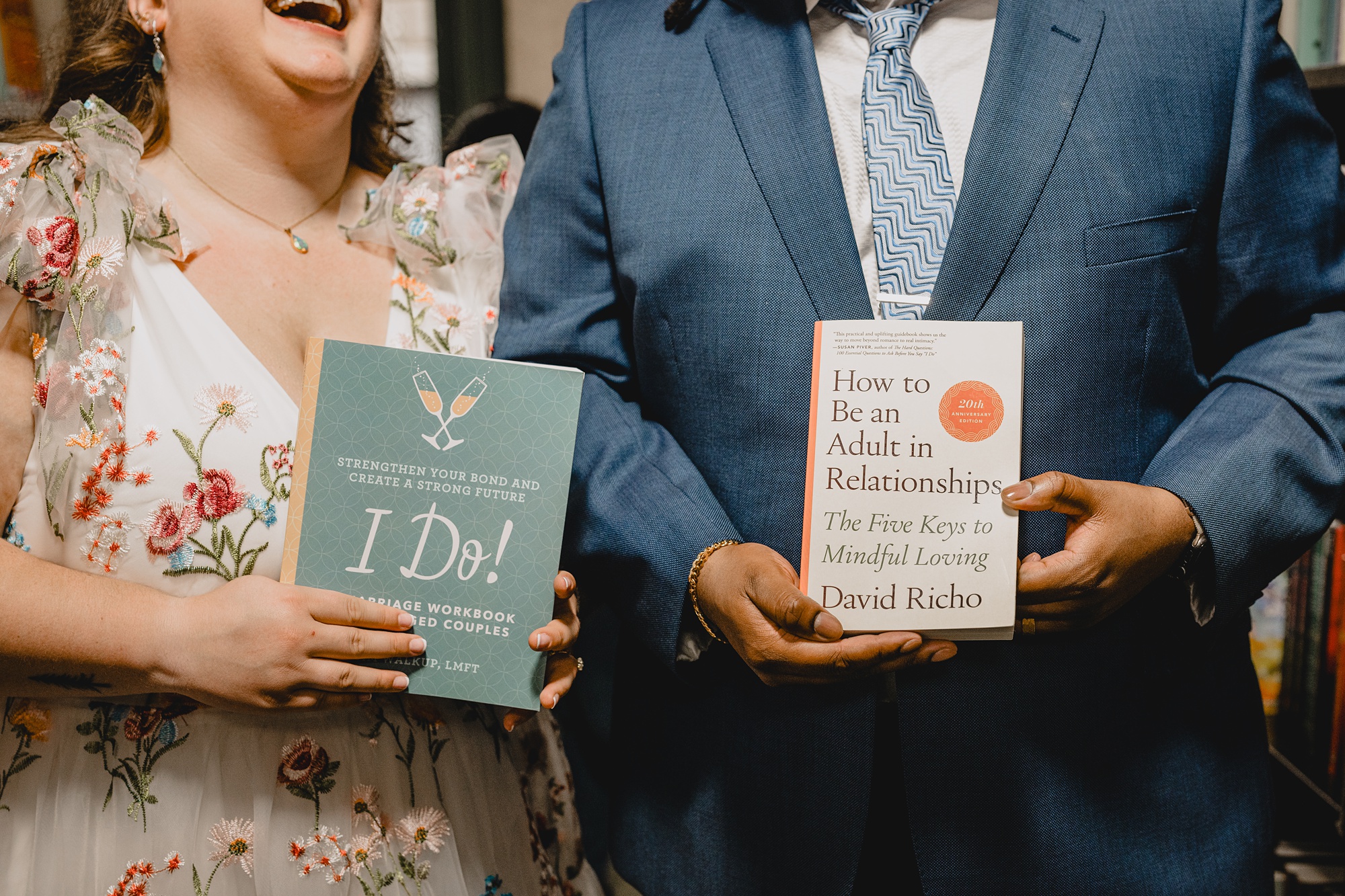 couple olds relationship books in row of shelves at Barnes & Noble in NYC