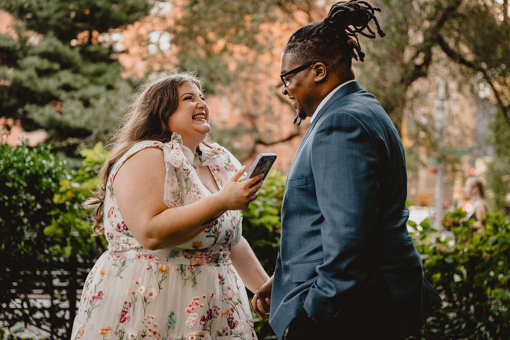 woman reads vows to groom in NYC park during elopement