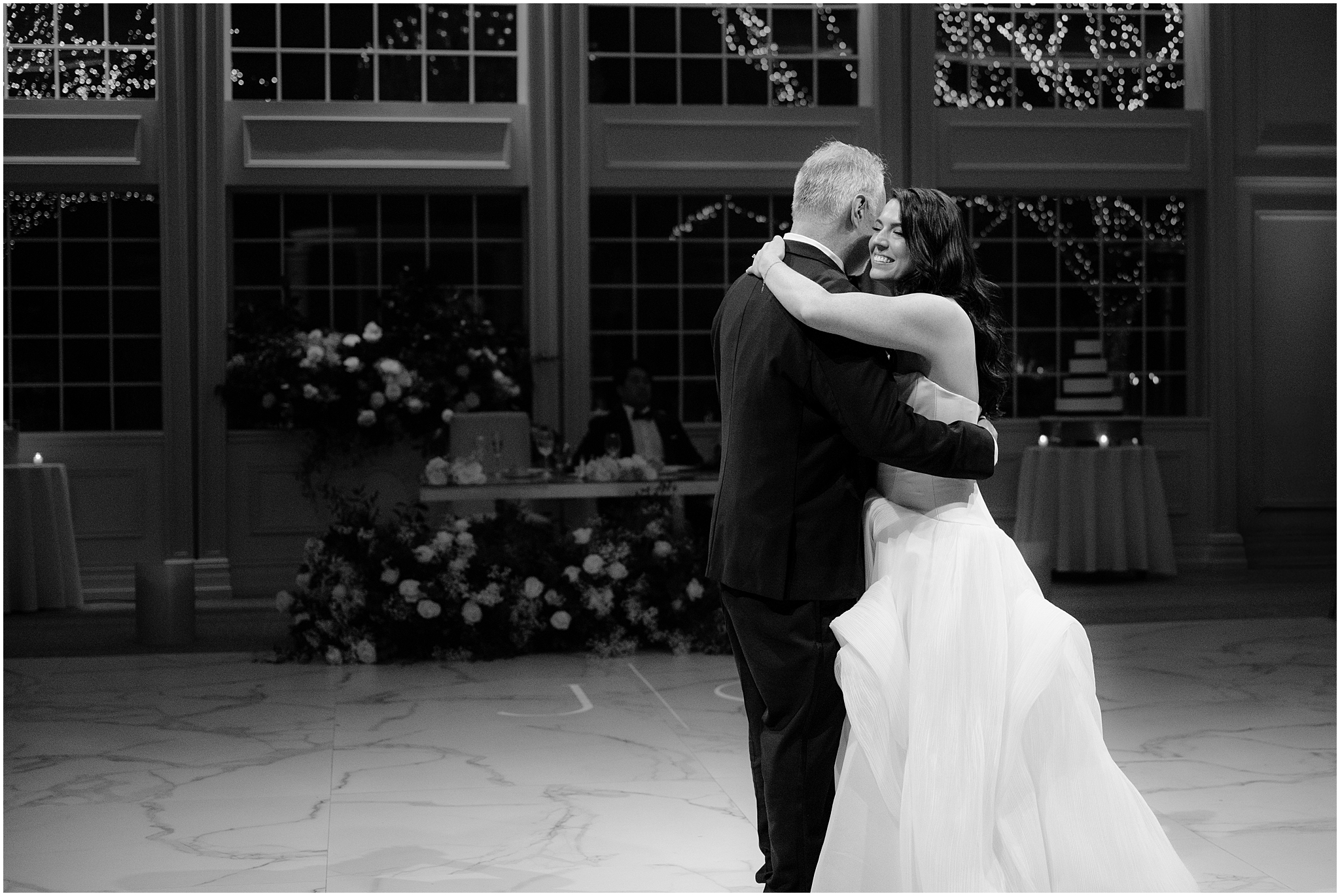 bride hugs father on dance floor during New Jersey wedding reception