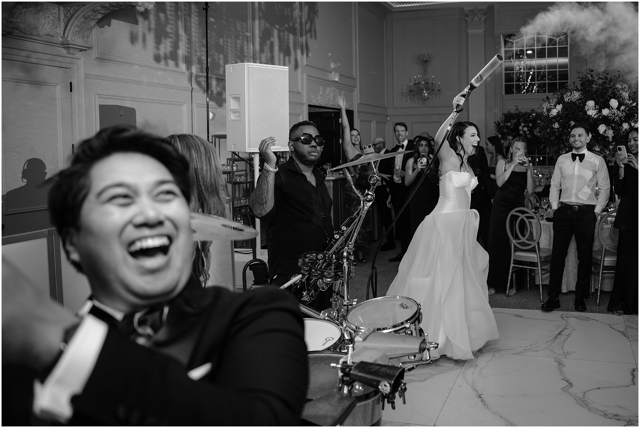 bride laughs with smoke machine on dance floor at River Vale NJ wedding reception