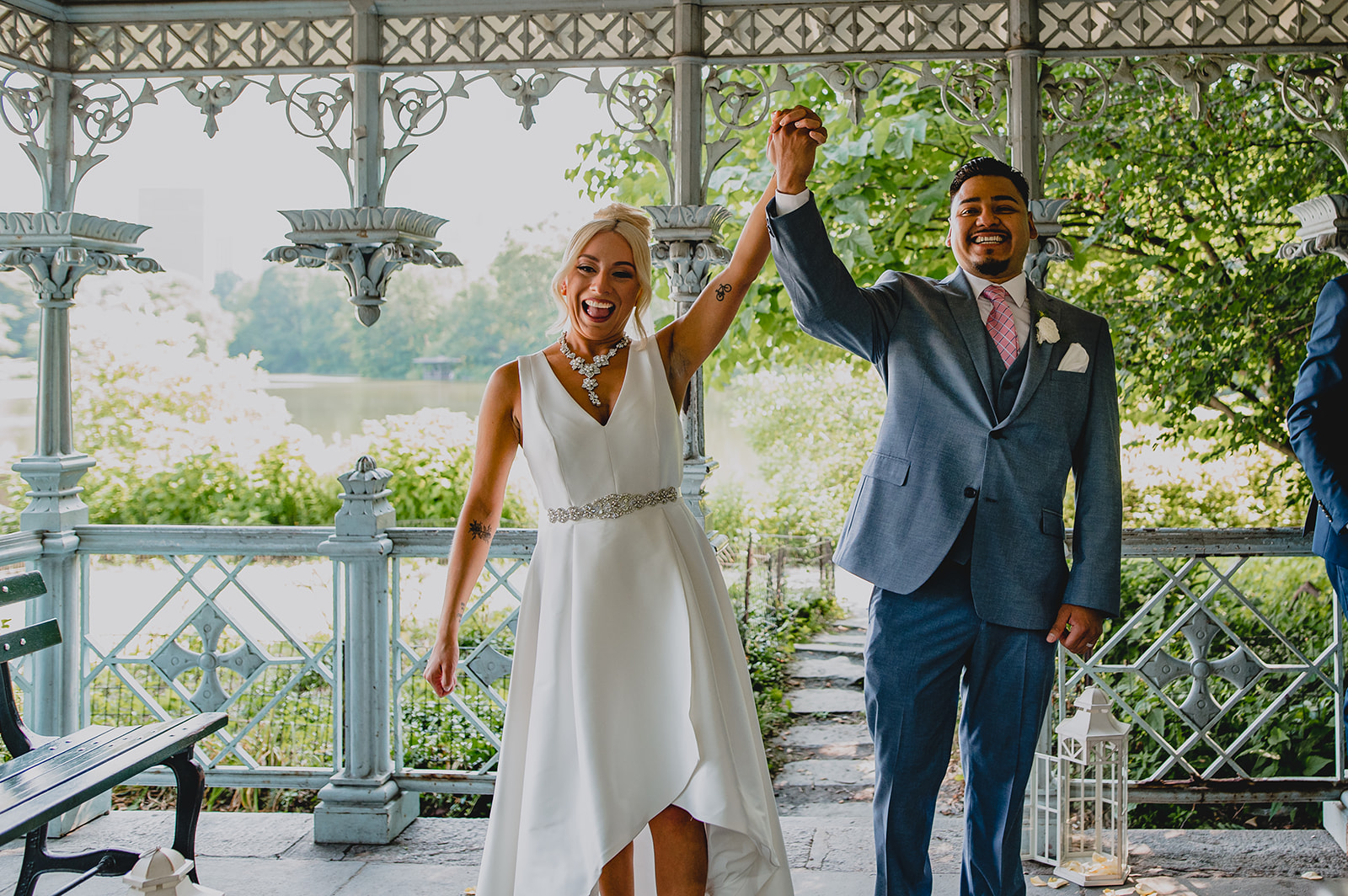 couple cheers during NYC elopement in park